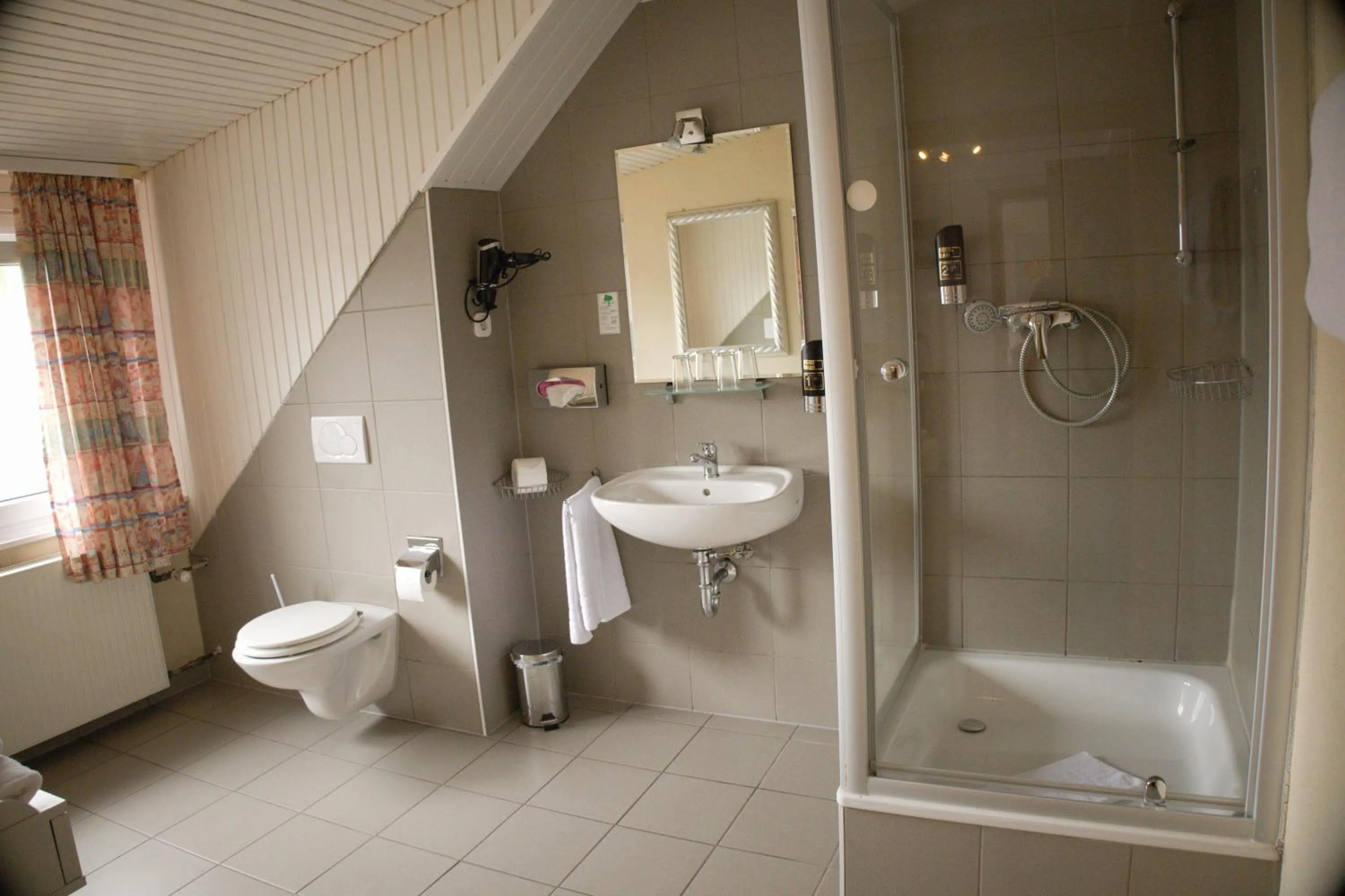 Quadruple Room with Private Bathroom in Hotel Grütering