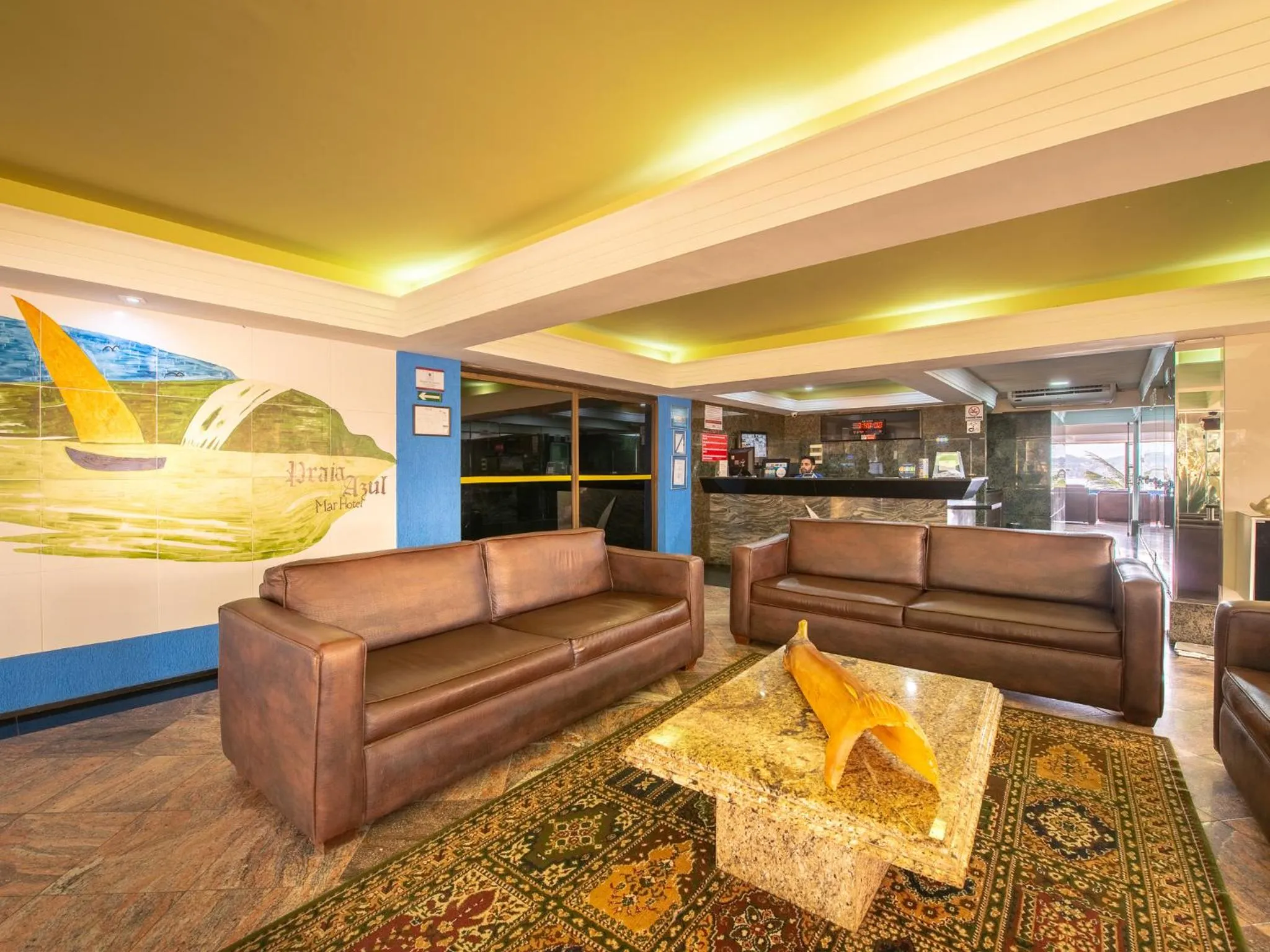 Communal lounge/ TV room in Happy Hotel Praia Azul