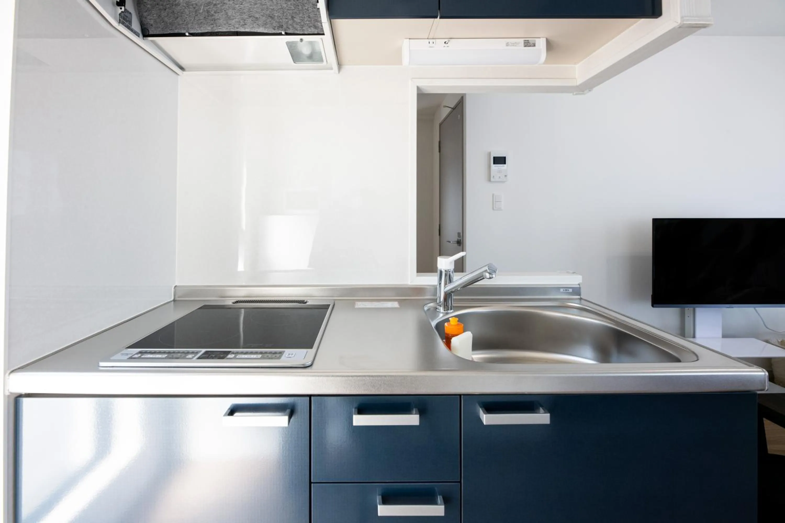 Kitchen or kitchenette in Grand Inn Canalside