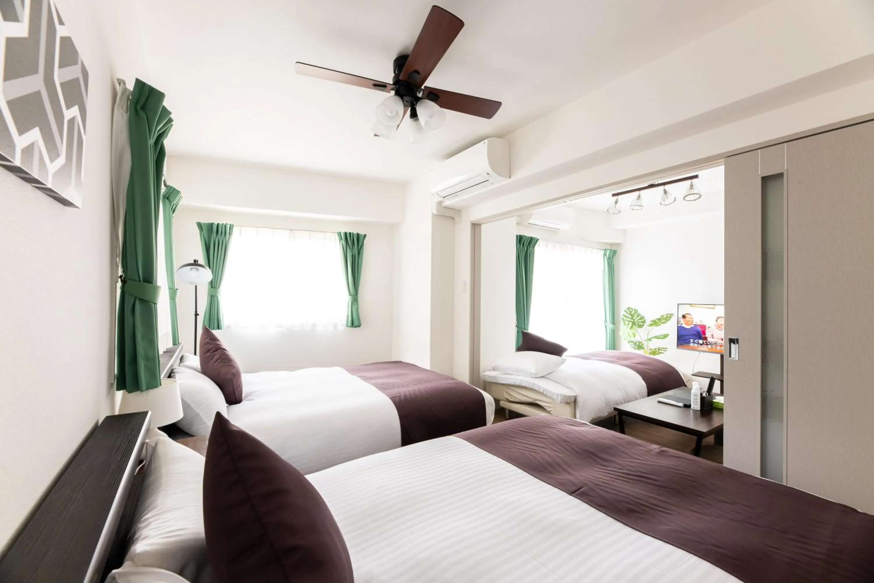 Bed in Grand Inn Canalside