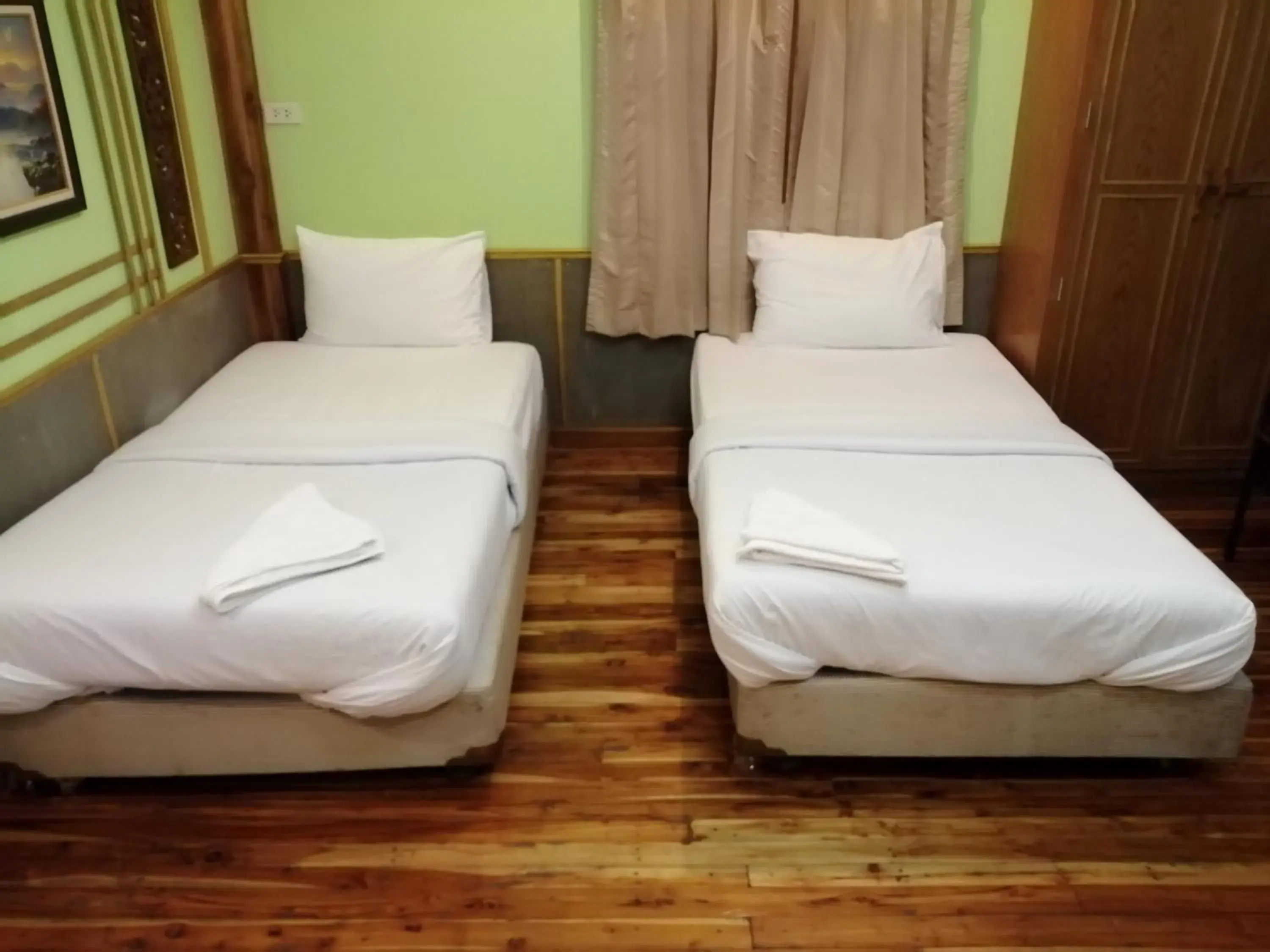 Bed in Nang Phraya Resort Bed in Nang Phraya Resort