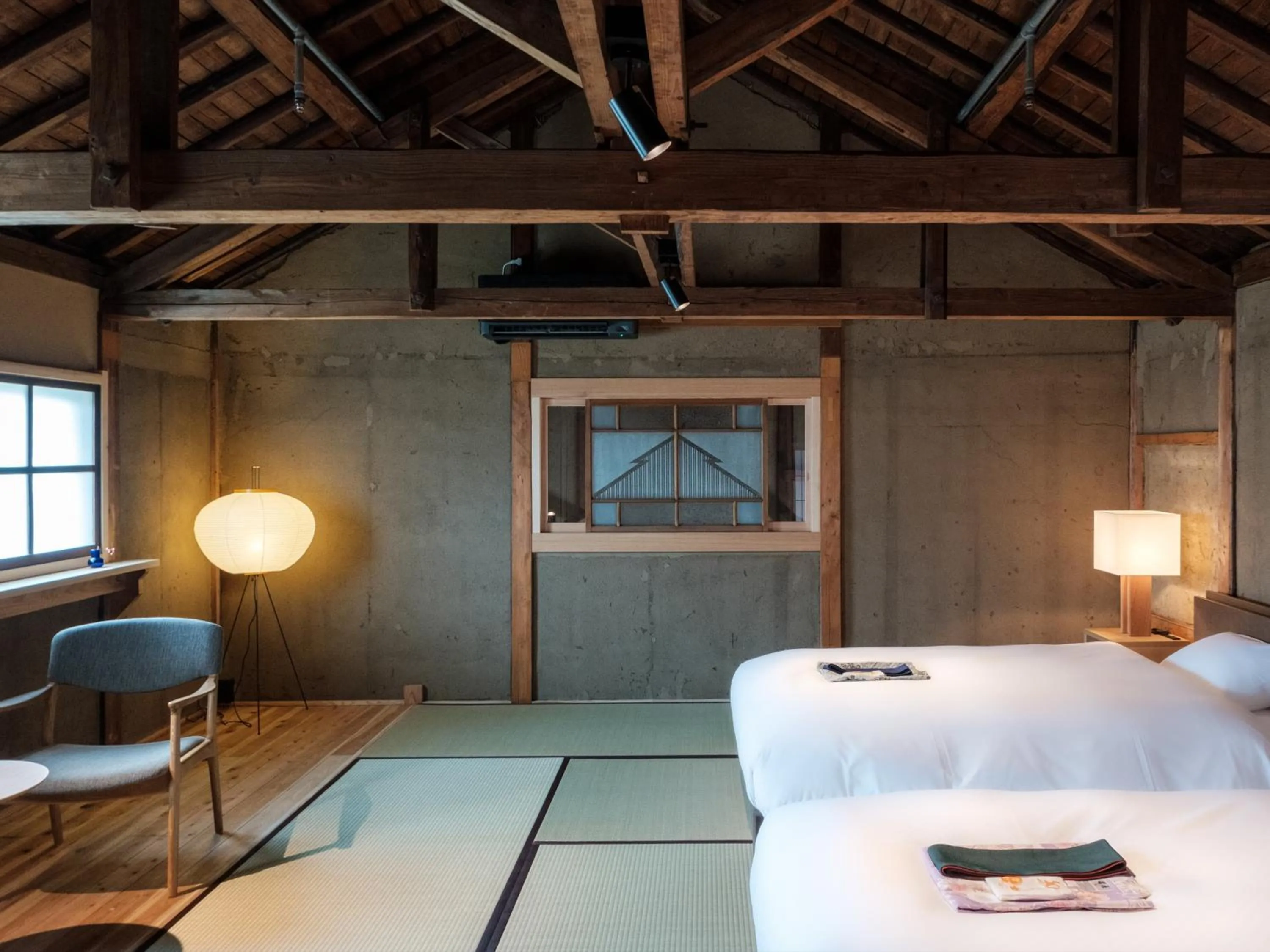 Bed in NIPPONIA HOTEL Yamefukushima Merchant Town