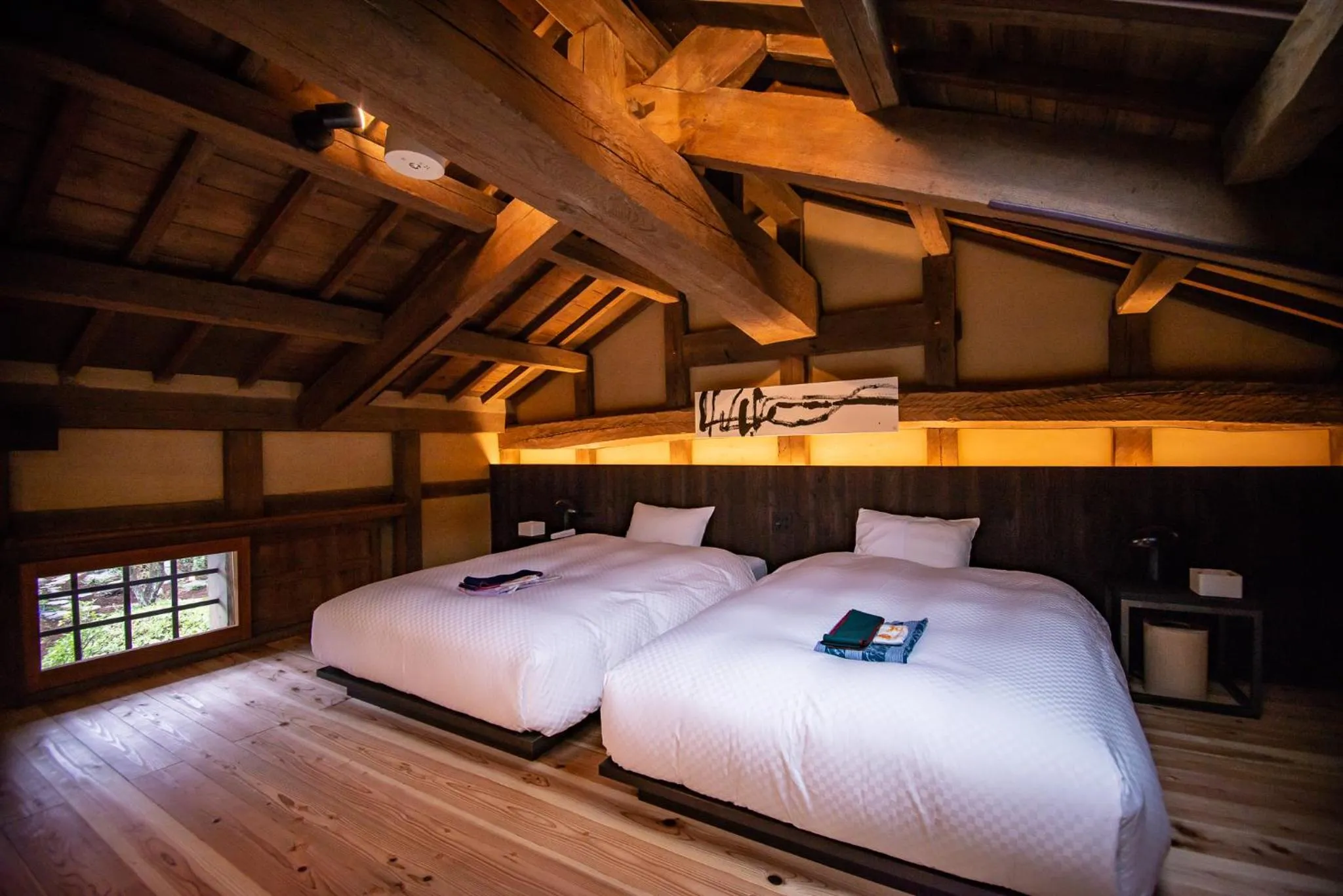 Bed in NIPPONIA HOTEL Ozu Castle Town