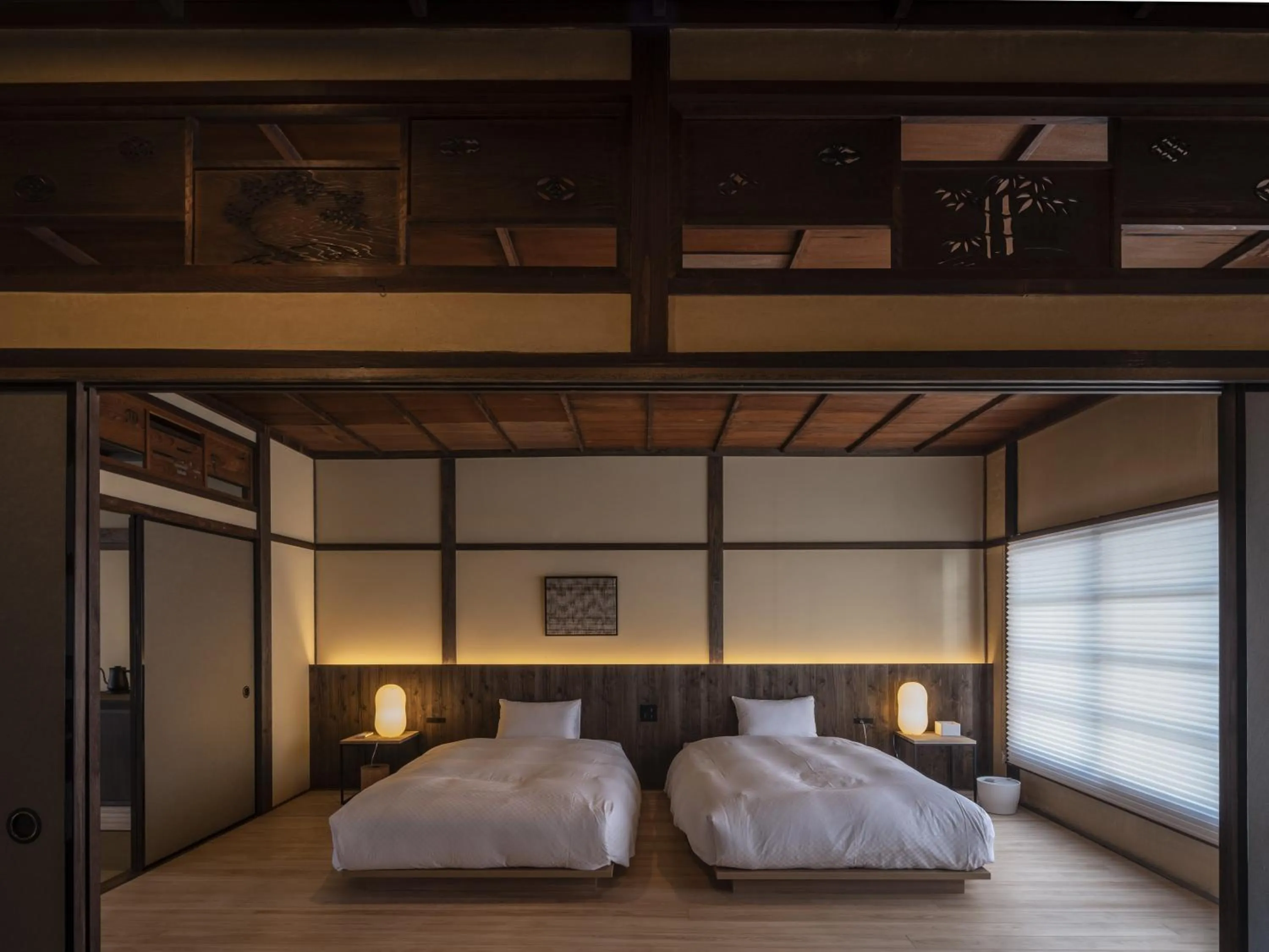 Bed in NIPPONIA HOTEL Ozu Castle Town