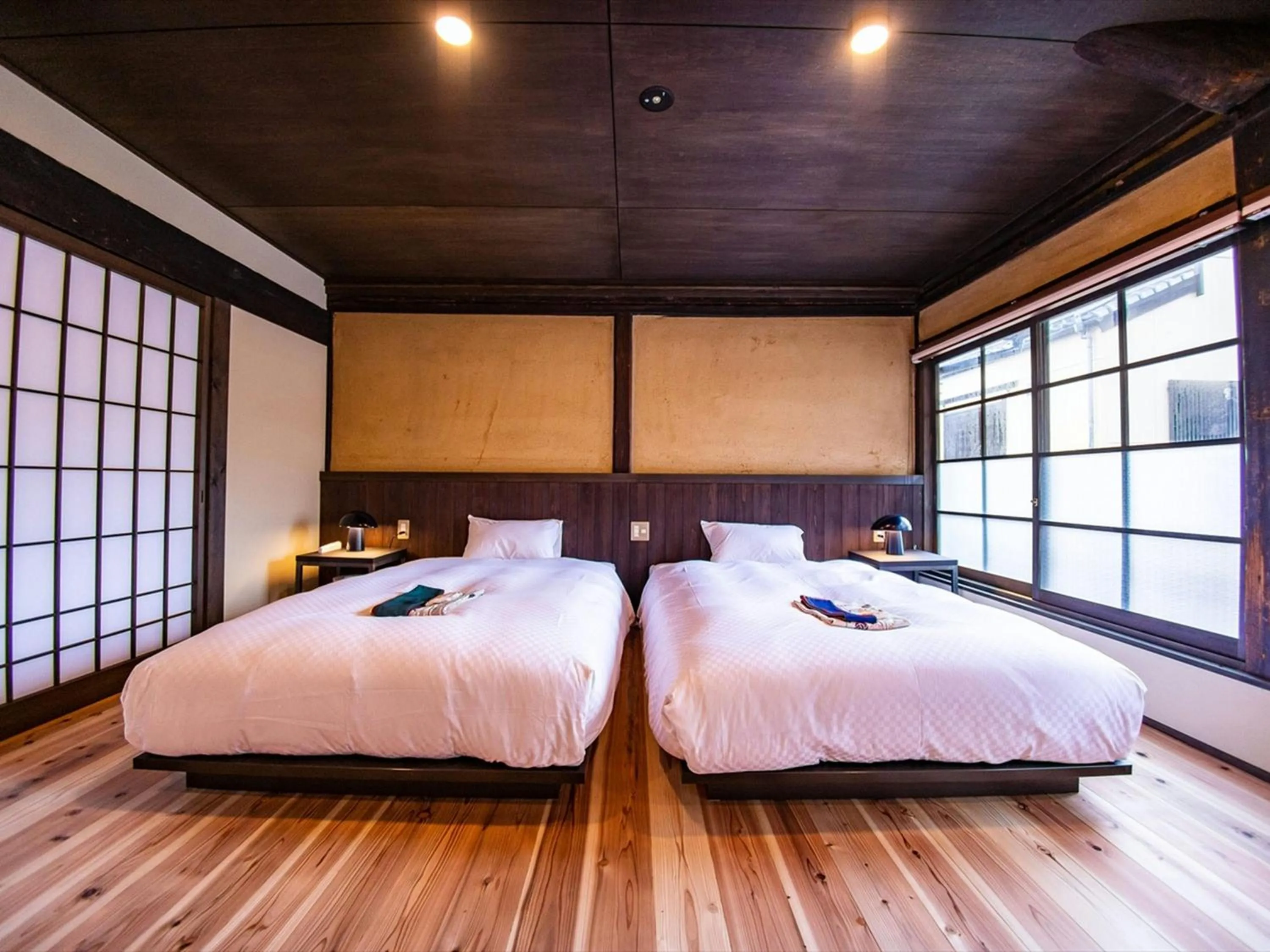 Bed in NIPPONIA HOTEL Ozu Castle Town