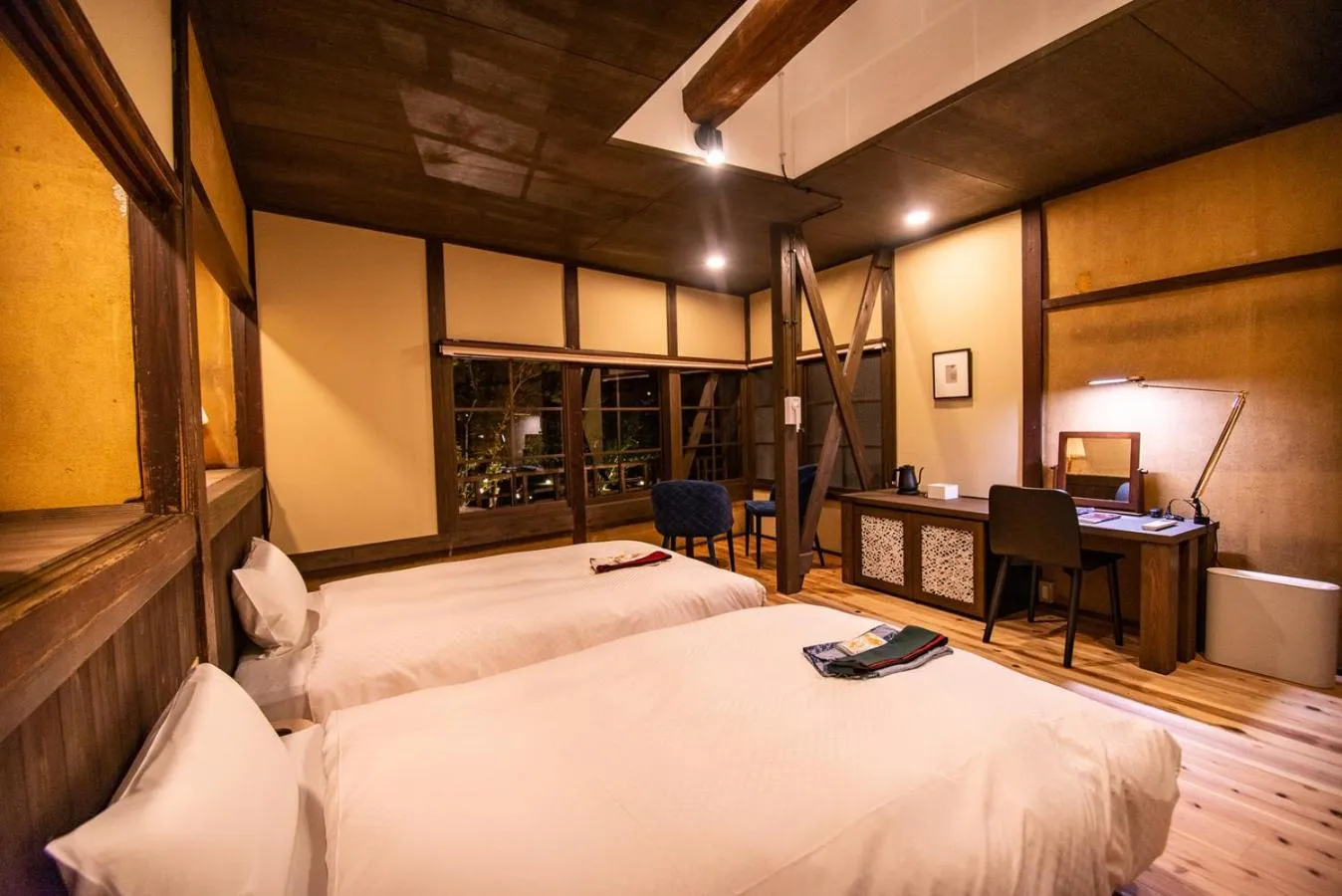 Bed in NIPPONIA HOTEL Ozu Castle Town