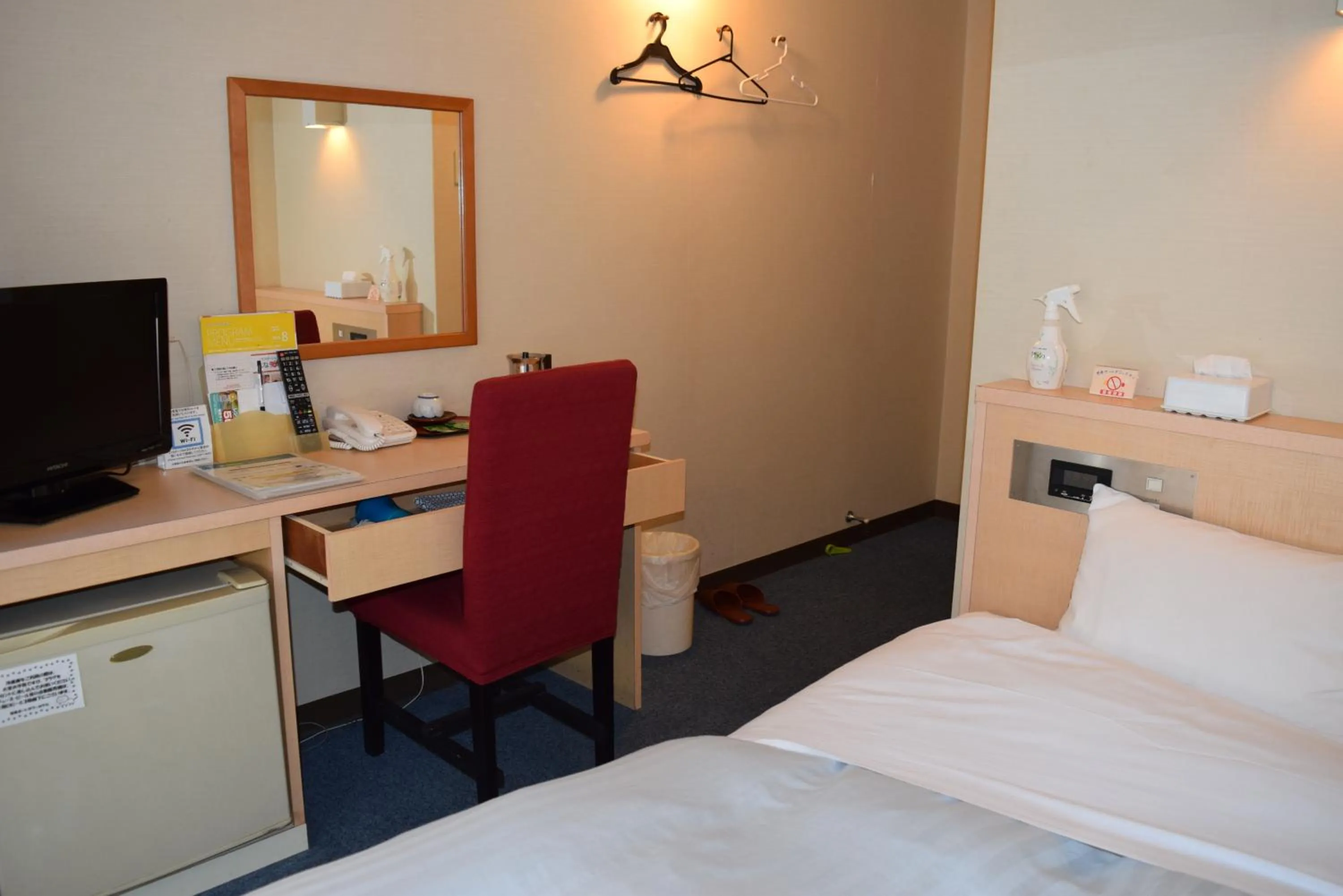 Bed in Amami Port Tower Hotel