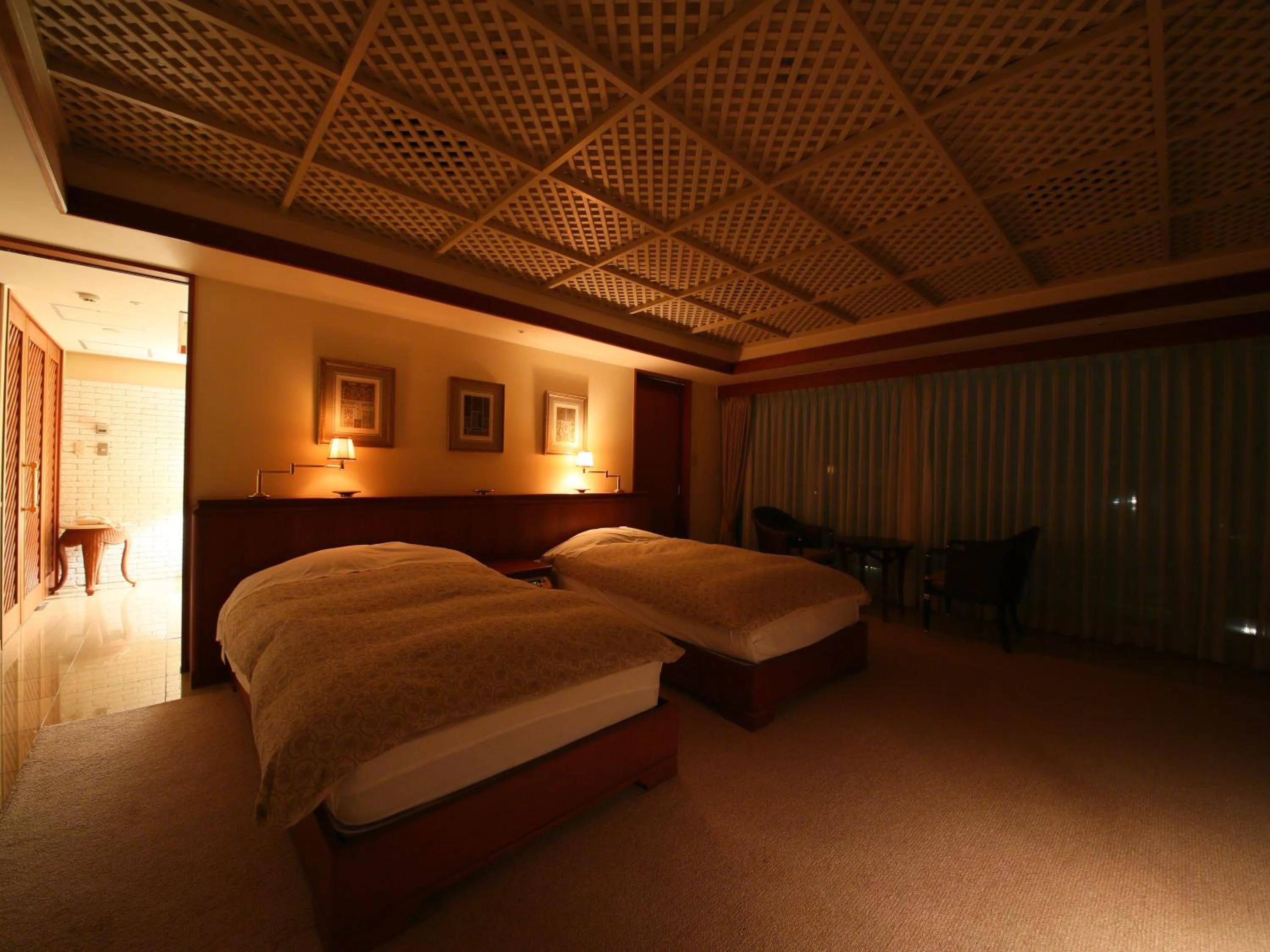 Bed in Nishiizu Crystal View Hotel