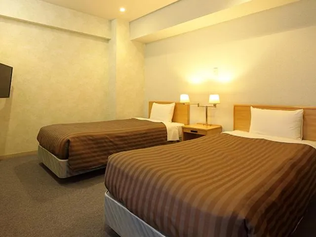 Bed in Nishiizu Crystal View Hotel