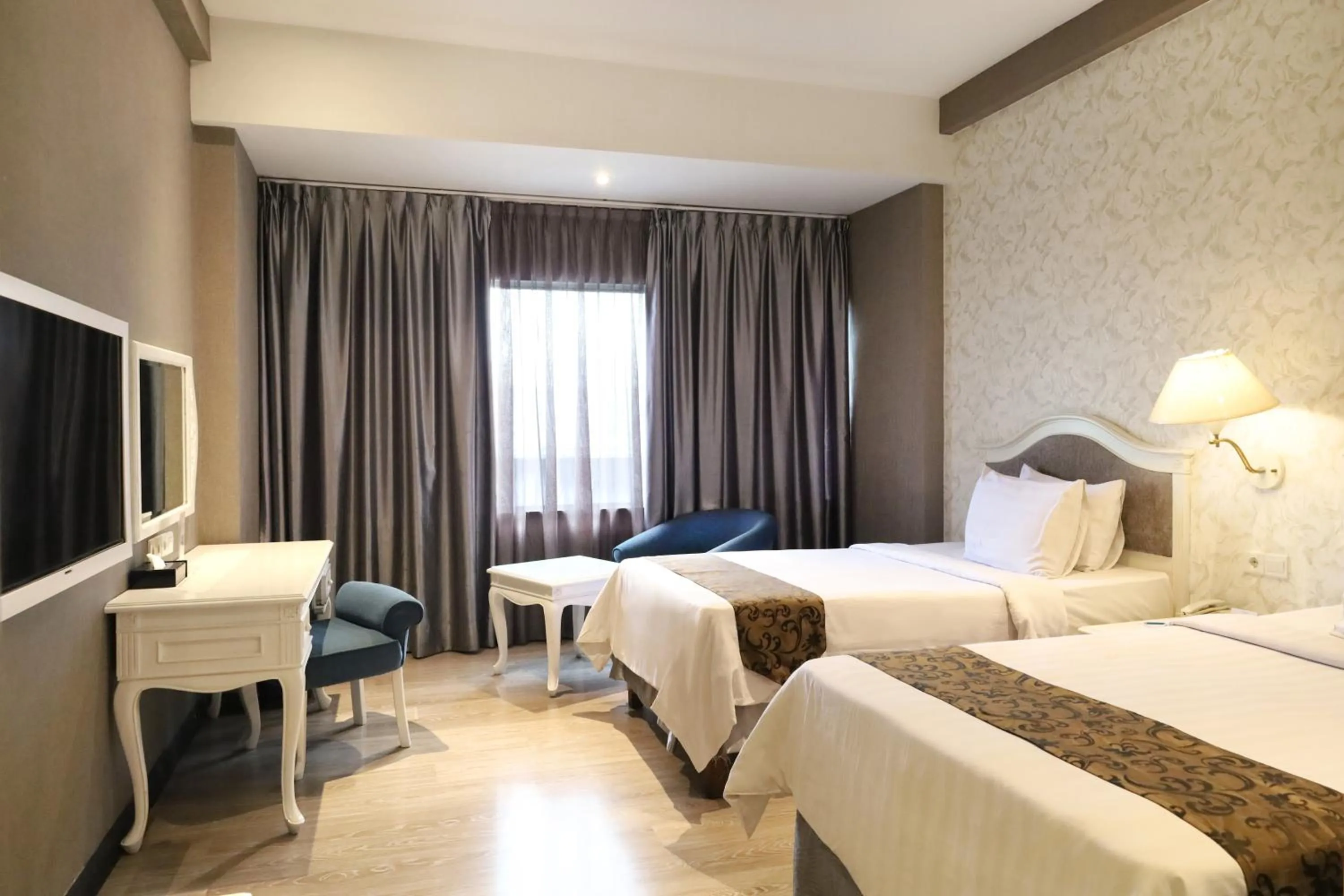 Photo of the whole room, Bed in Le Polonia Hotel & Convention Medan