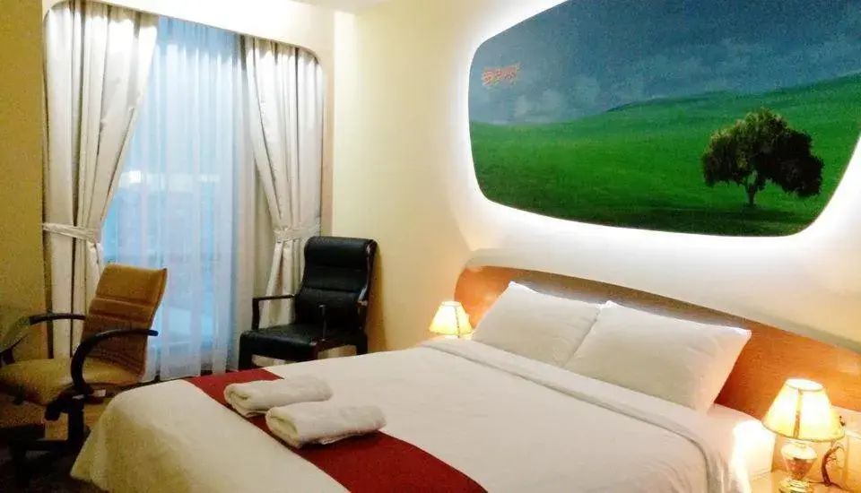 Bed in Business Hotel Tomang