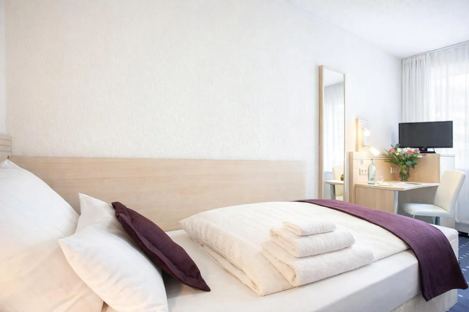 Bed in Rhein Neckar City Hotel SAP Arena 24h Self Check-in