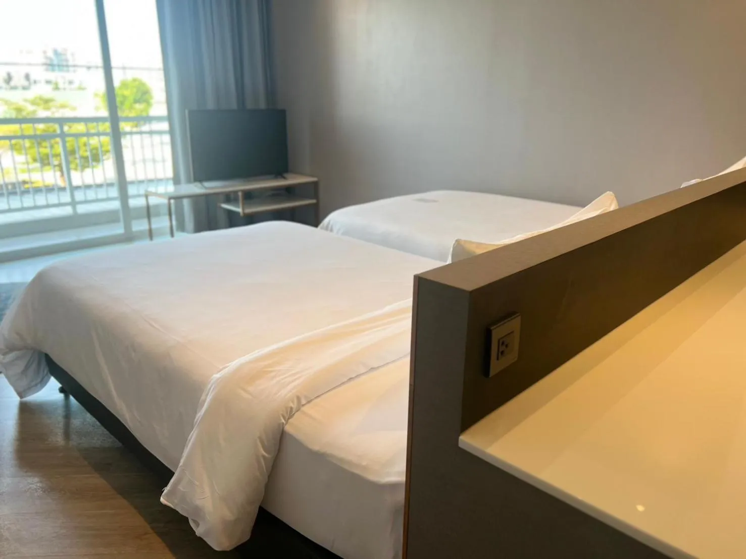 Bed in Golden City Rayong Hotel