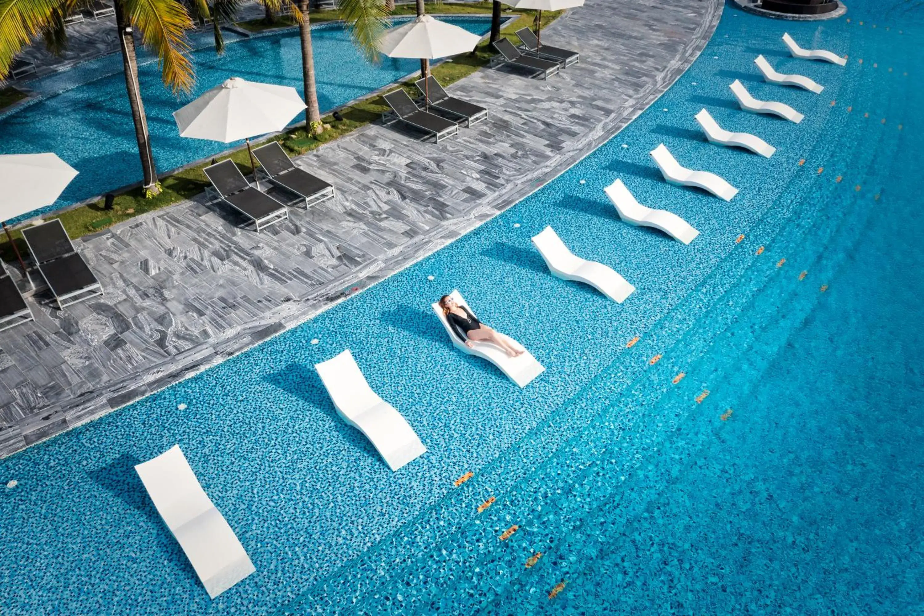Swimming pool in Mövenpick Resort Waverly Phu Quoc Swimming pool in Mövenpick Resort Waverly Phu Quoc