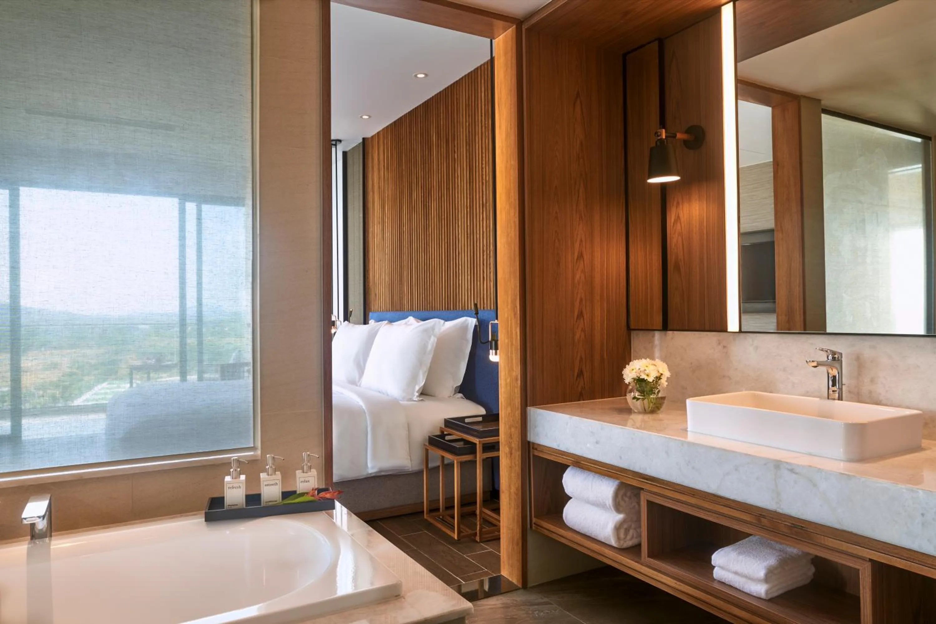 Bathroom, Bed in Mövenpick Resort Waverly Phu Quoc