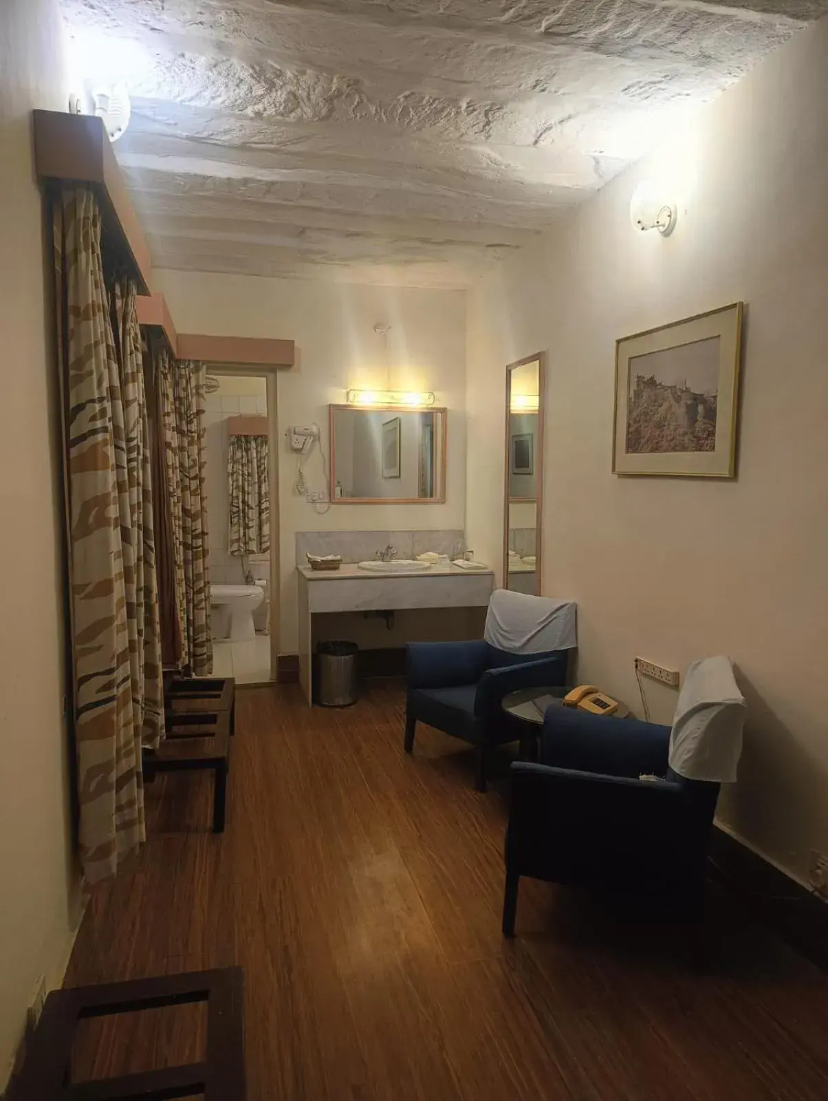 Living room, Bed in Karni Bhawan Palace - Heritageby HRH Group of Hotels Living room, Bed in Karni Bhawan Palace - Heritageby HRH Group of Hotels