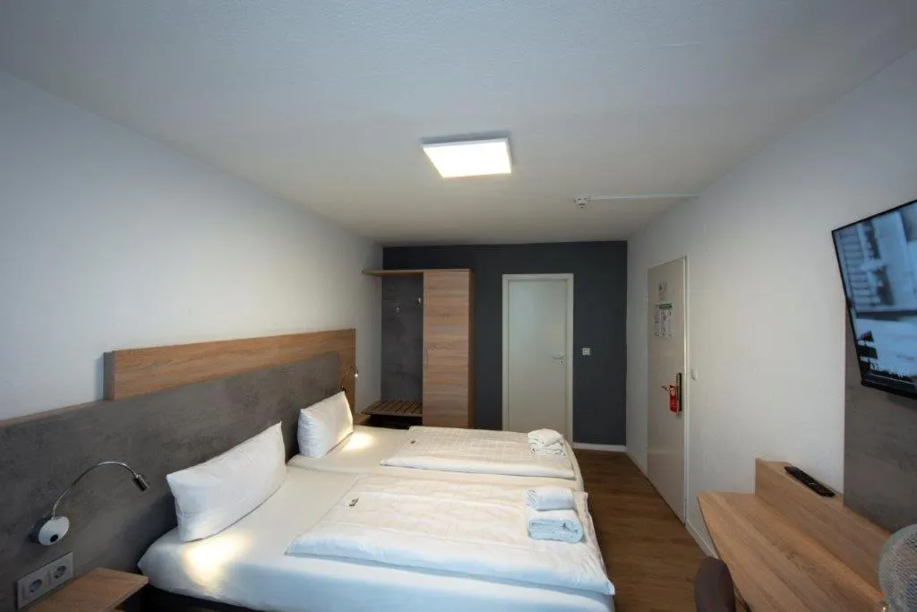 Bed in PANORAMA HOTEL in Neustadt an der Weinstraße