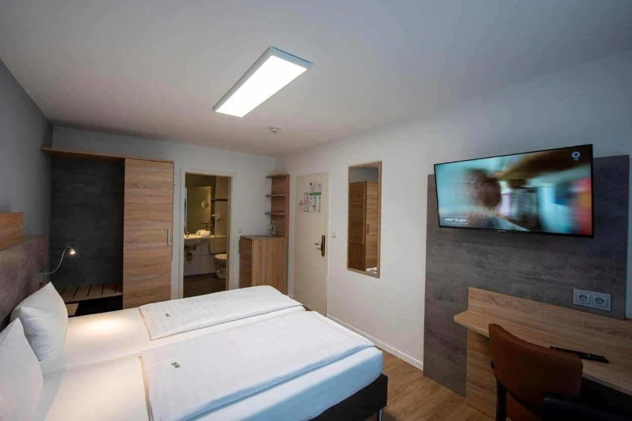 Bed in PANORAMA HOTEL in Neustadt an der Weinstraße