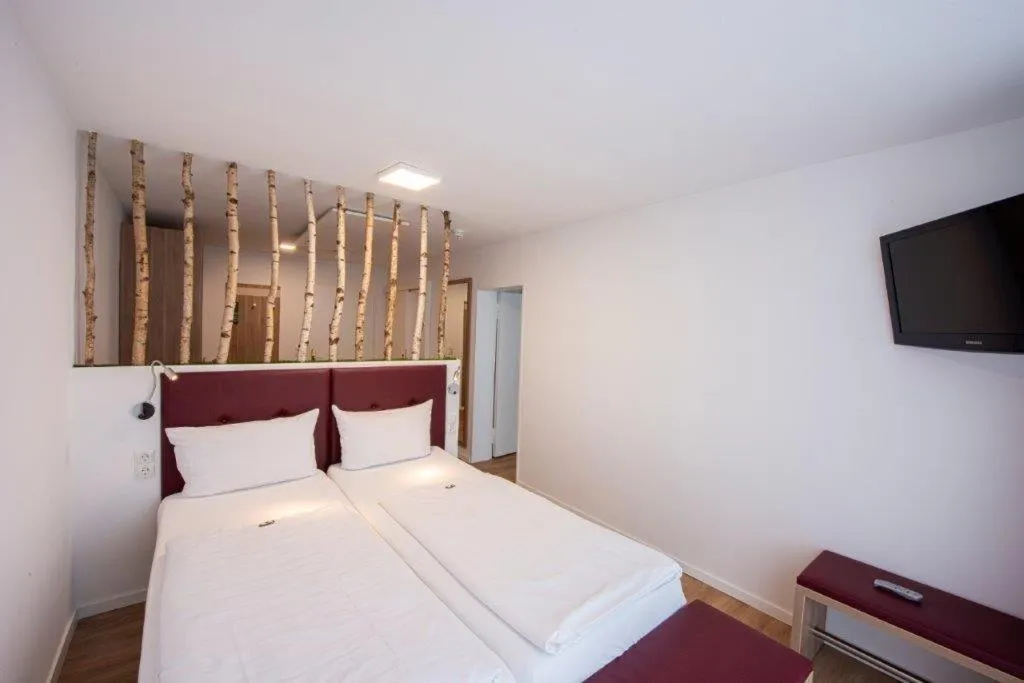 Bed in PANORAMA HOTEL in Neustadt an der Weinstraße