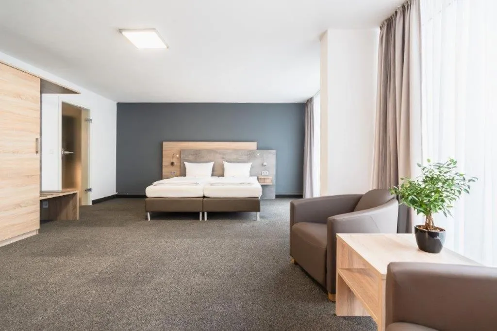 Bed in PANORAMA HOTEL in Neustadt an der Weinstraße