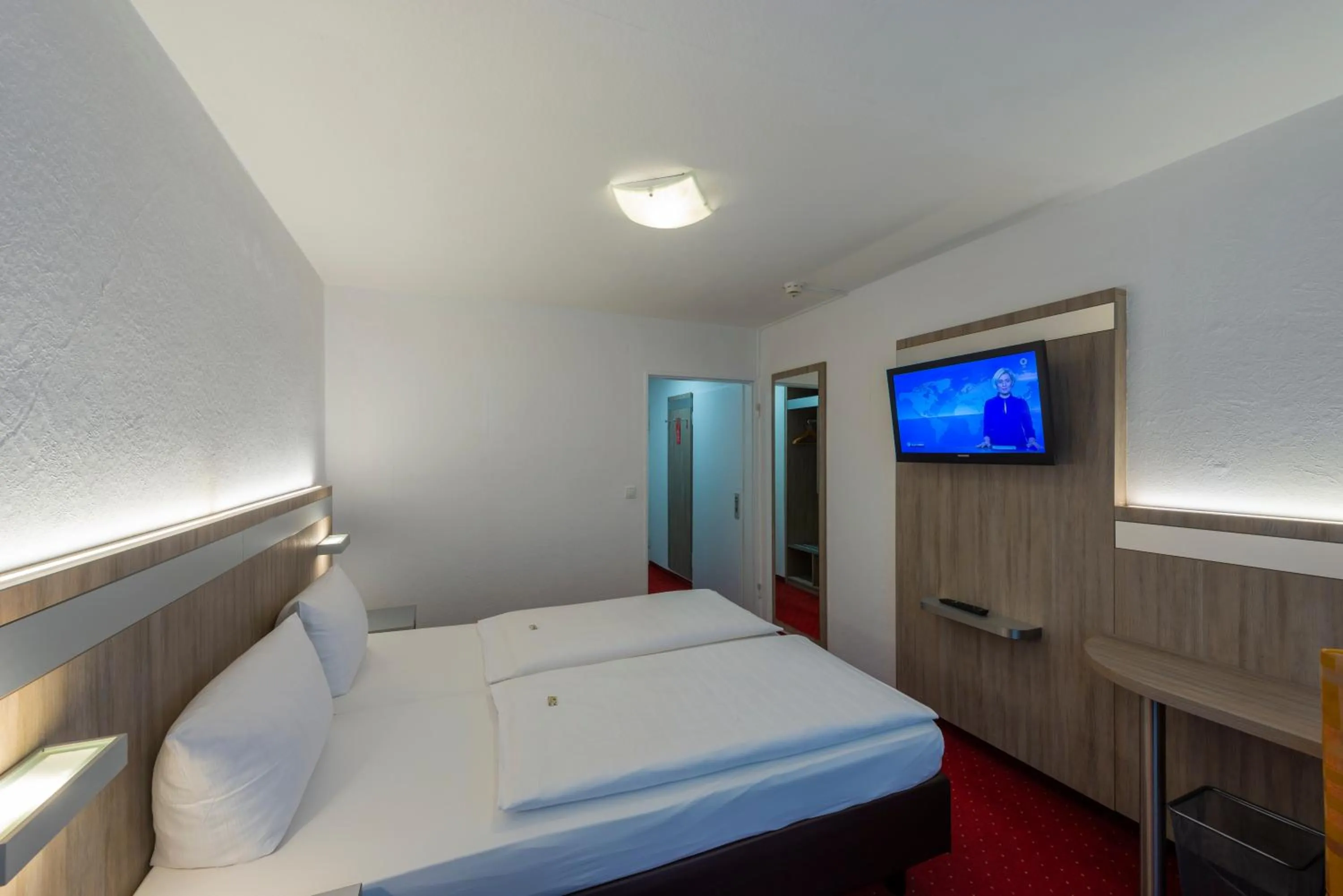 Bed in PANORAMA HOTEL in Neustadt an der Weinstraße