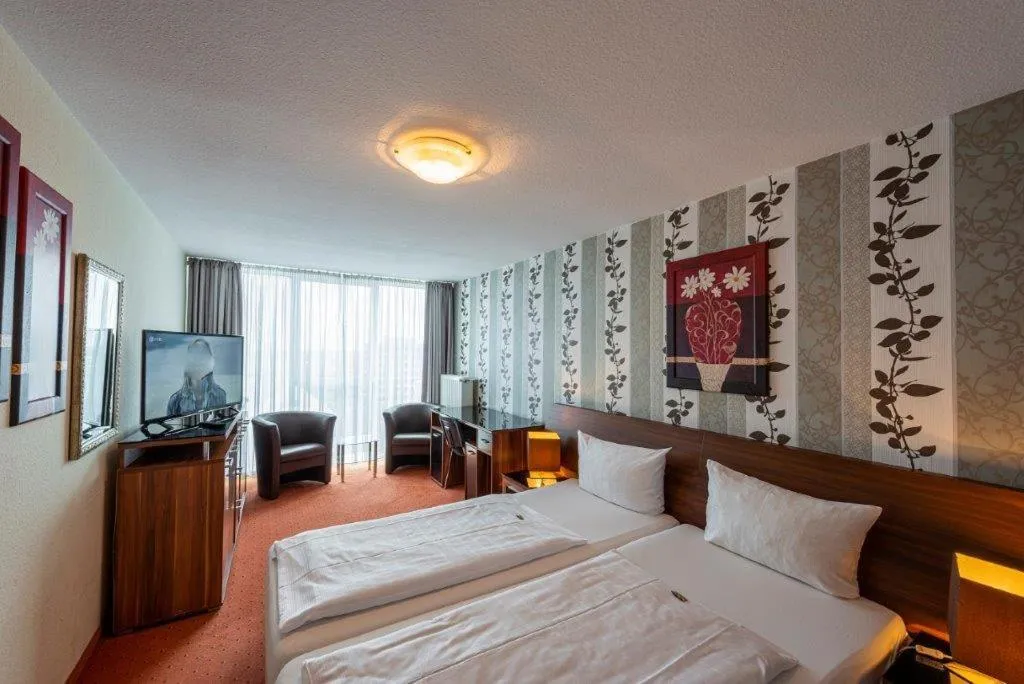 Bed in PANORAMA HOTEL in Neustadt an der Weinstraße