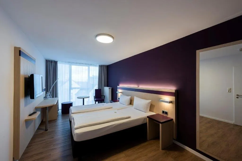 Bed in PANORAMA HOTEL in Neustadt an der Weinstraße