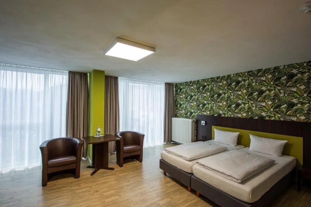 Bed in PANORAMA HOTEL in Neustadt an der Weinstraße