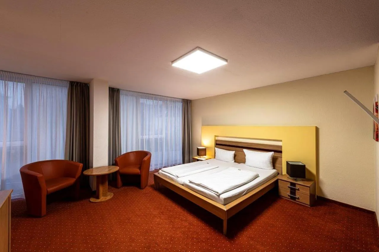 Bed in PANORAMA HOTEL in Neustadt an der Weinstraße