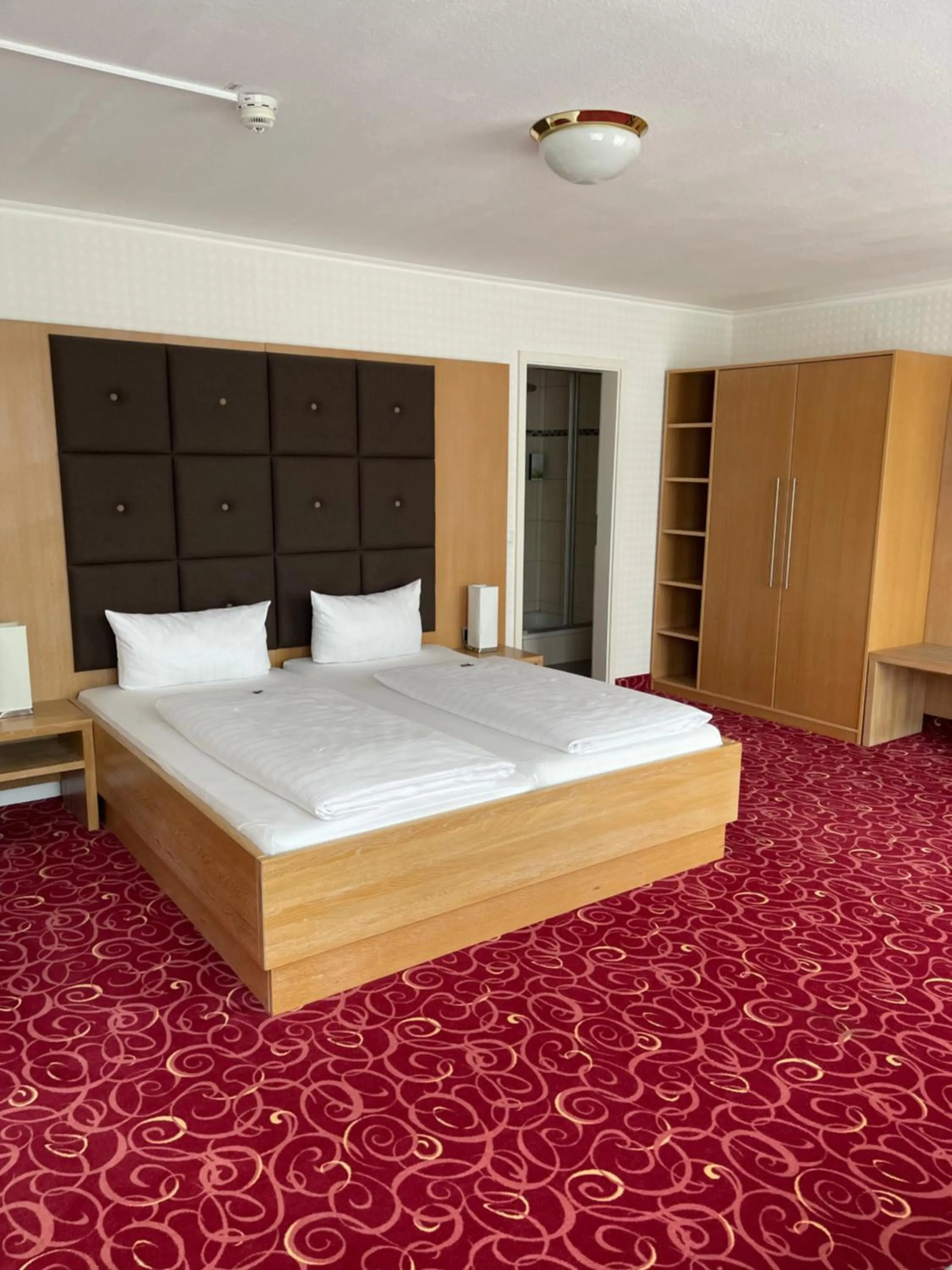 Bed in PANORAMA HOTEL in Neustadt an der Weinstraße