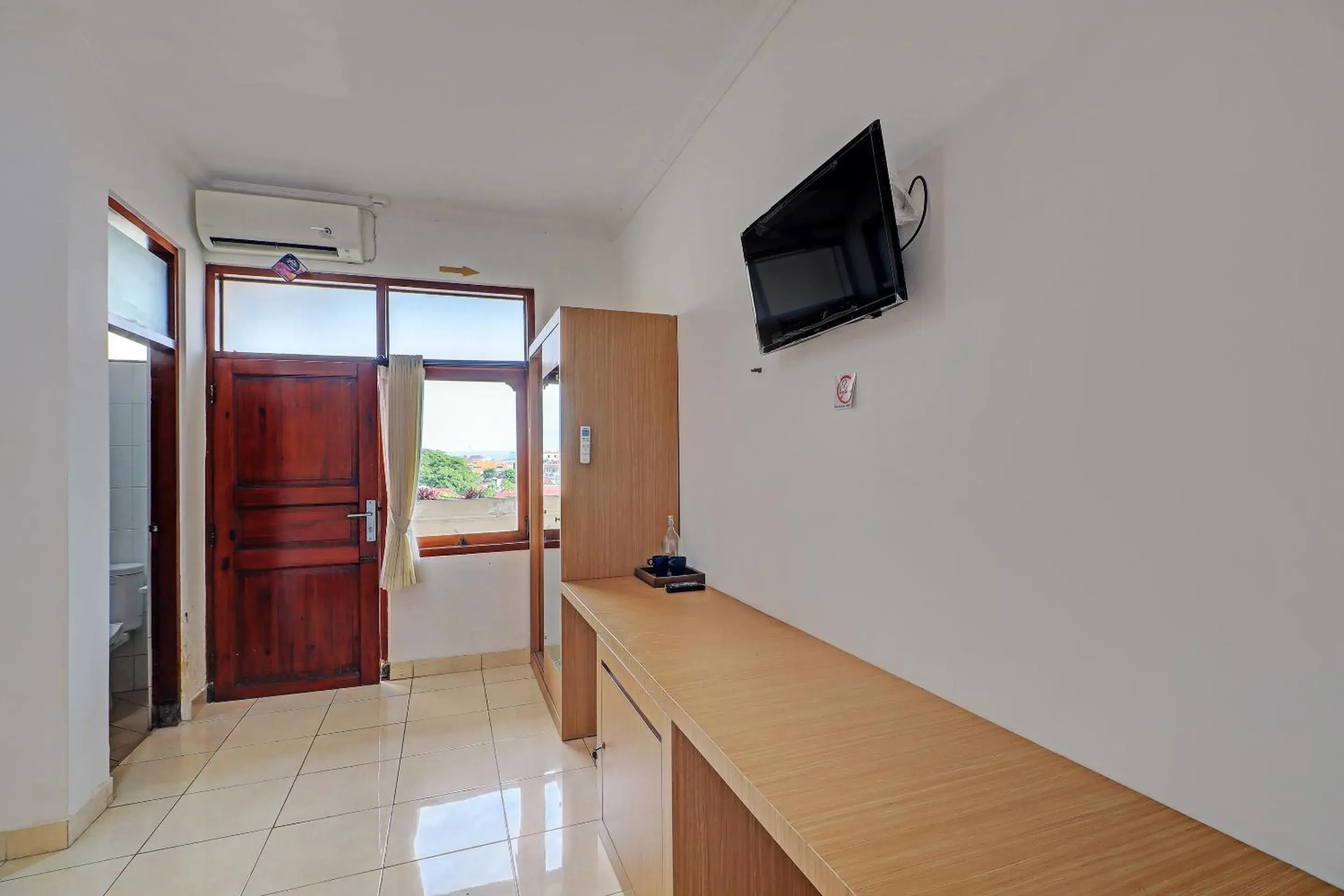 Bedroom, TV/Entertainment Center in Guest House Simalem