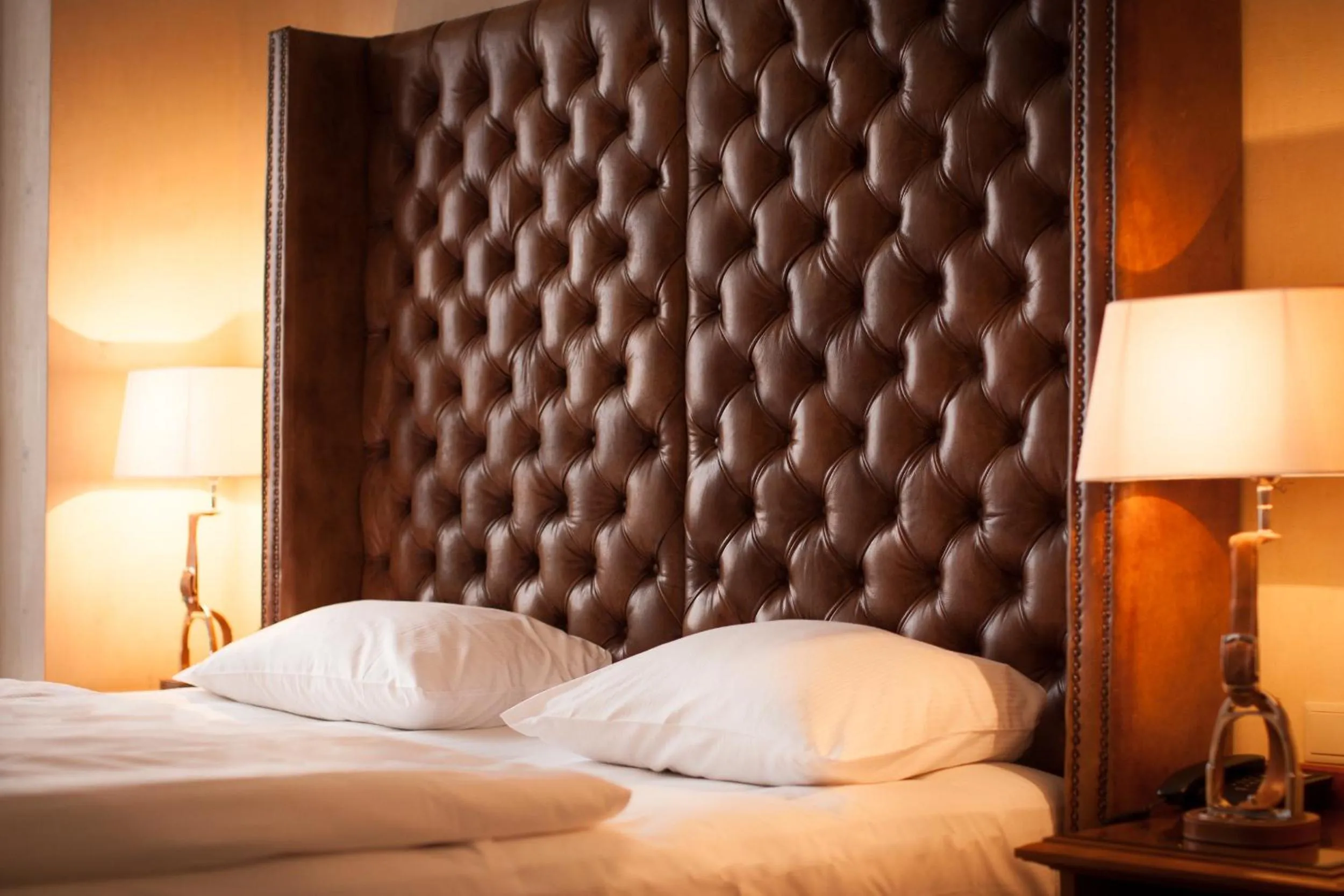 Bed in The Ascot Hotel