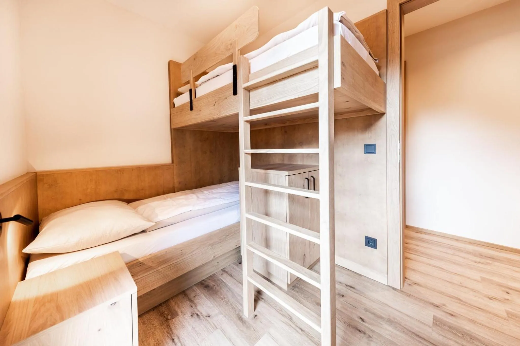 Bathroom, Bed in Das Bayrischzell Familotel Oberbayern