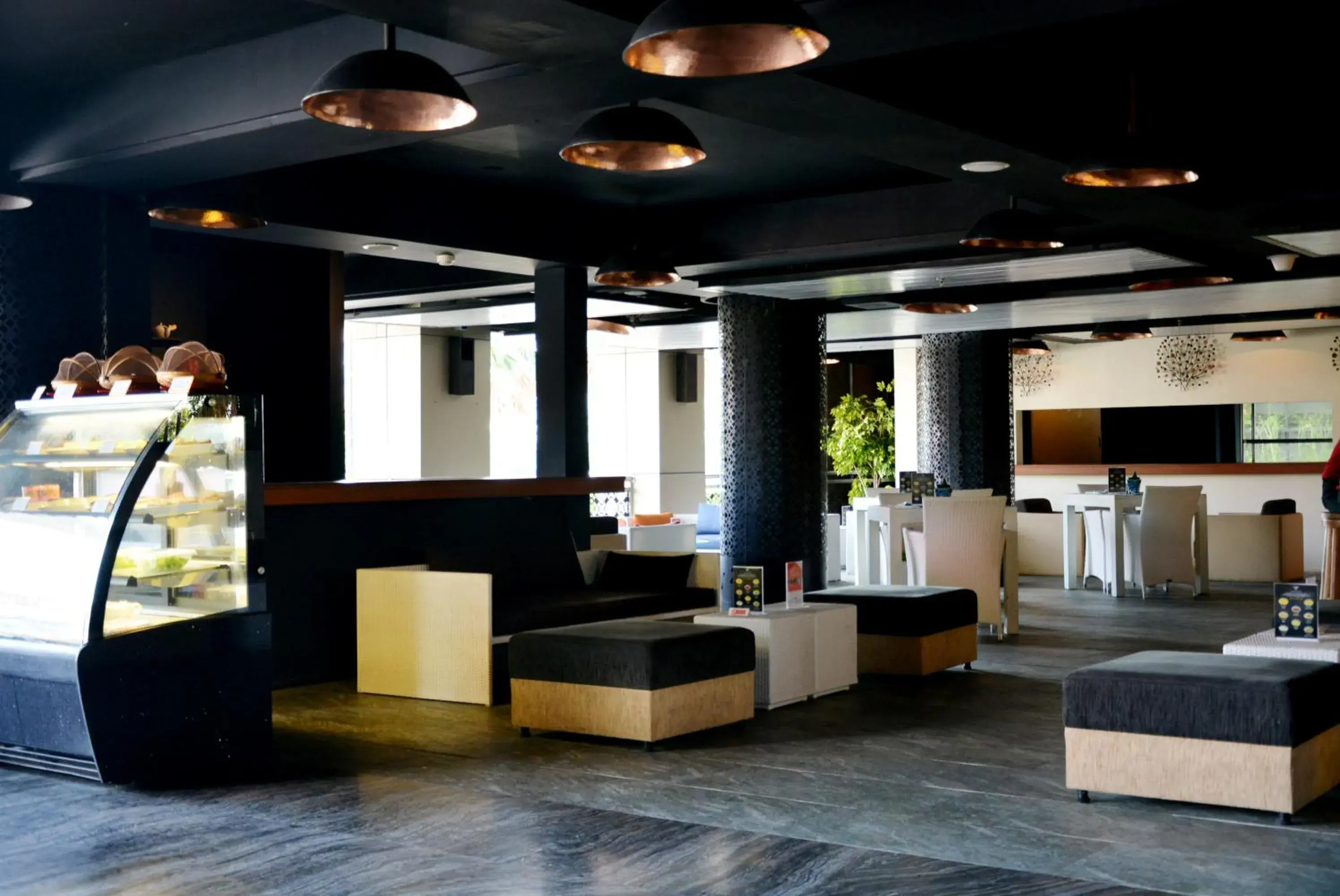 Lounge or bar in Ramada by Wyndham Bali Sunset Road Kuta Lounge or bar in Ramada by Wyndham Bali Sunset Road Kuta