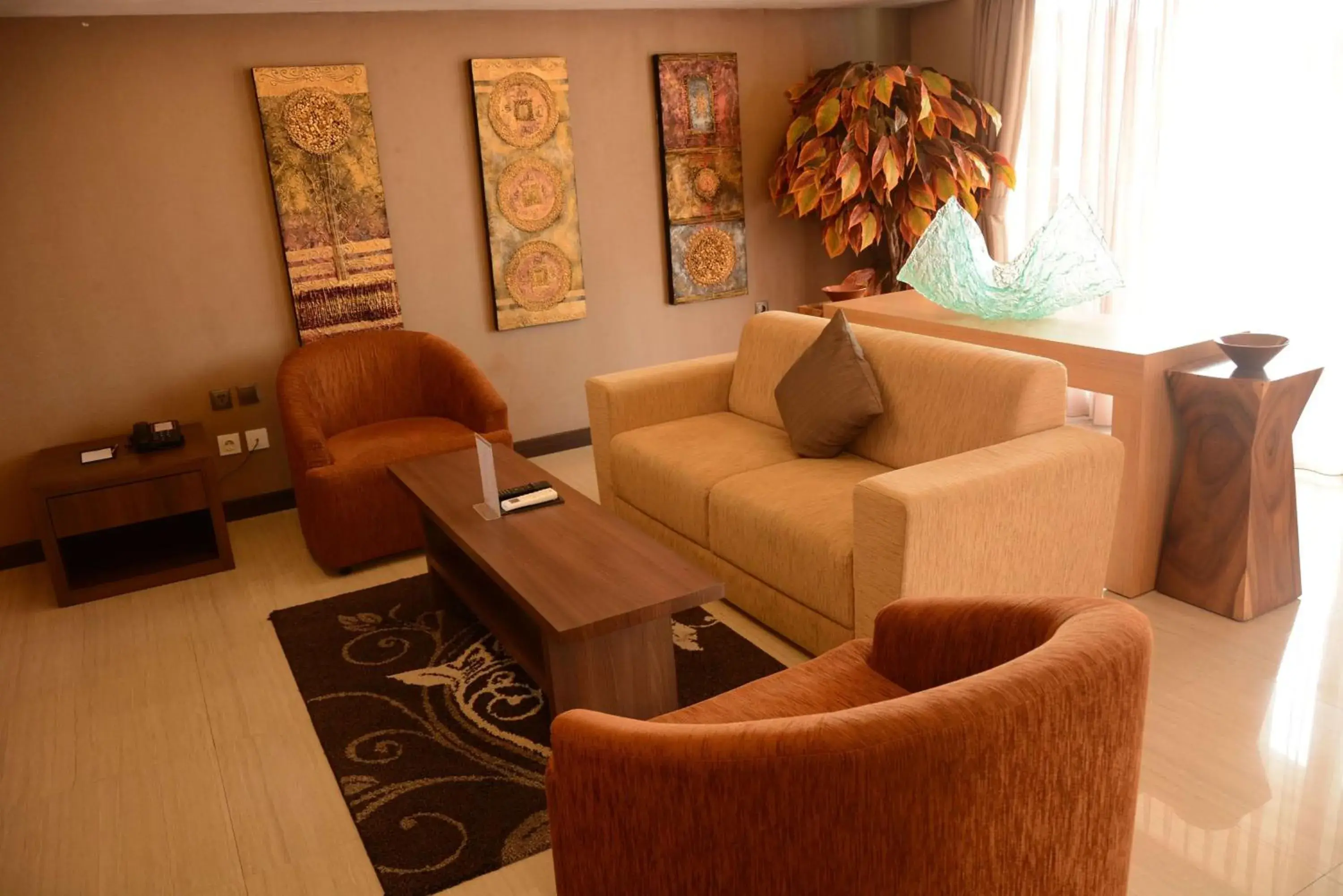 Living room in Ramada by Wyndham Bali Sunset Road Kuta Living room in Ramada by Wyndham Bali Sunset Road Kuta