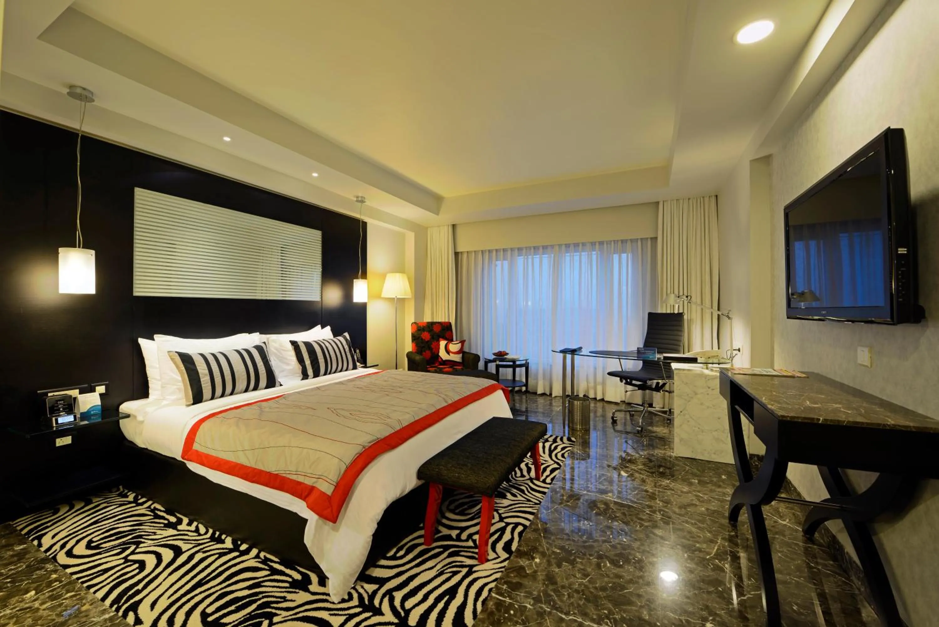 Photo of the whole room, Bed in Radisson Blu Hotel Ahmedabad