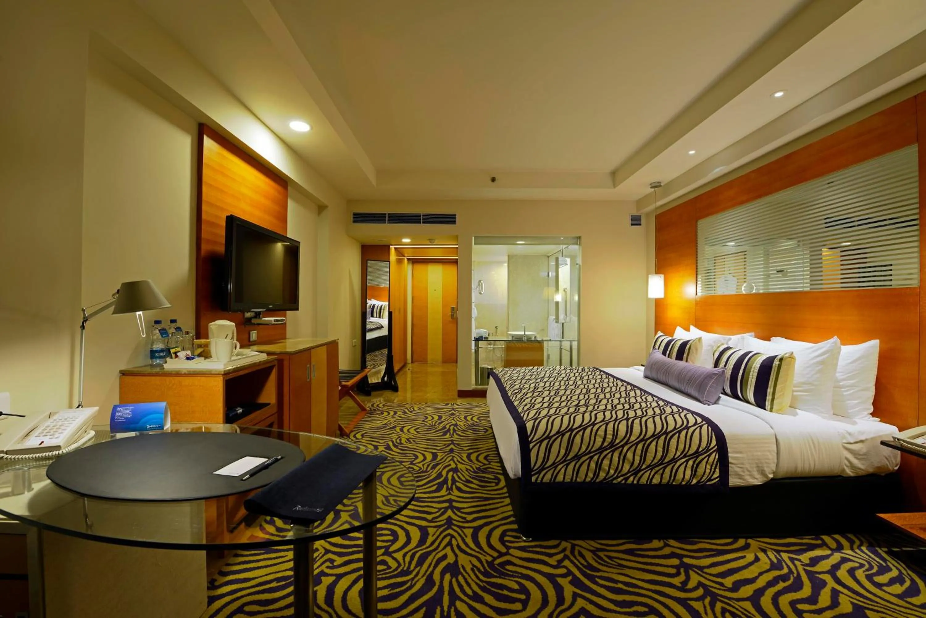 Photo of the whole room, Bed in Radisson Blu Hotel Ahmedabad