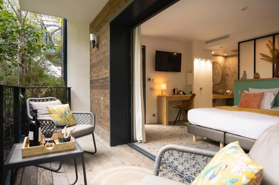 TV and multimedia, Bed in Le Lodge des Îles d'Or