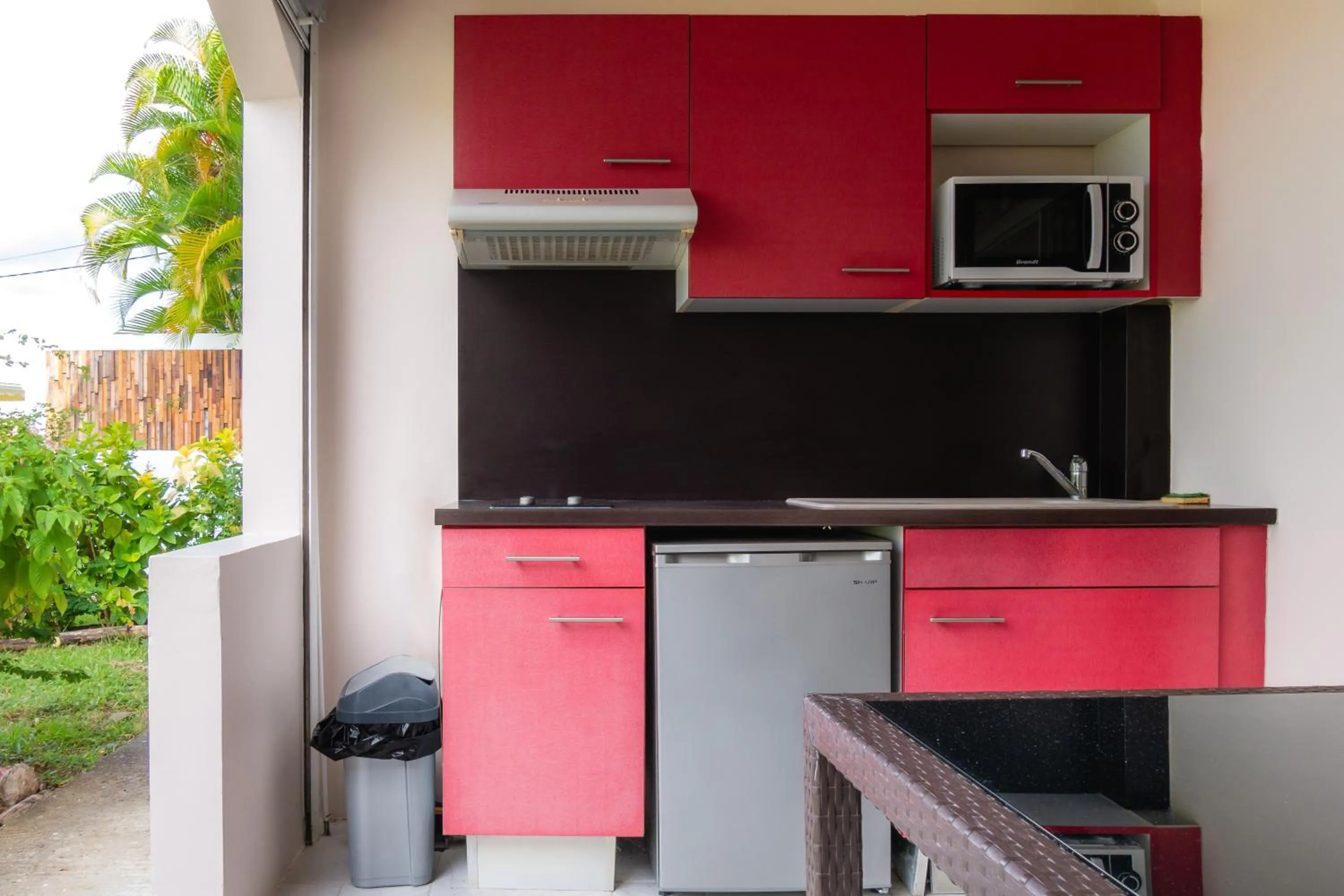 Kitchen or kitchenette in Hôtel Iloma