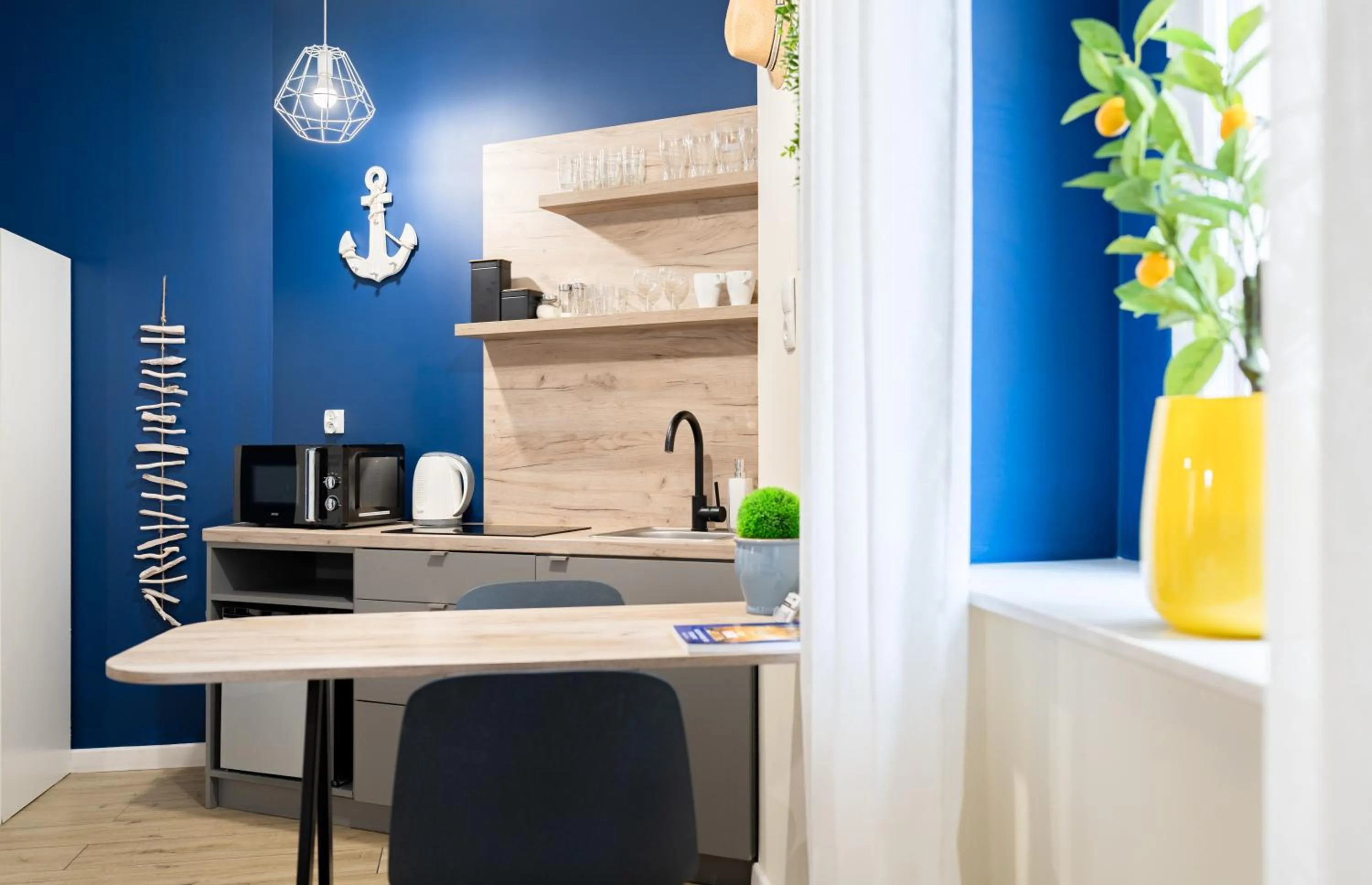 Kitchen or kitchenette in Łazienna Premier by Rentoom