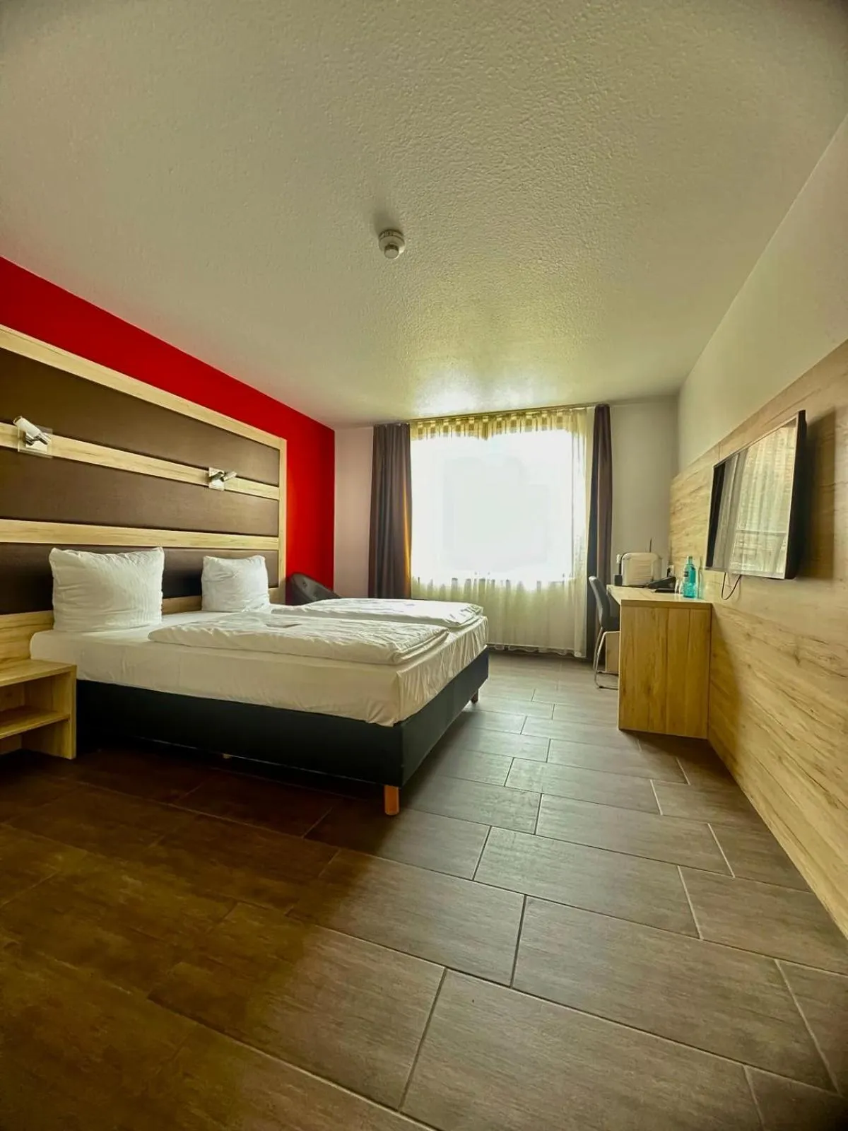 Photo of the whole room, Bed in ACHAT Hotel Heppenheim