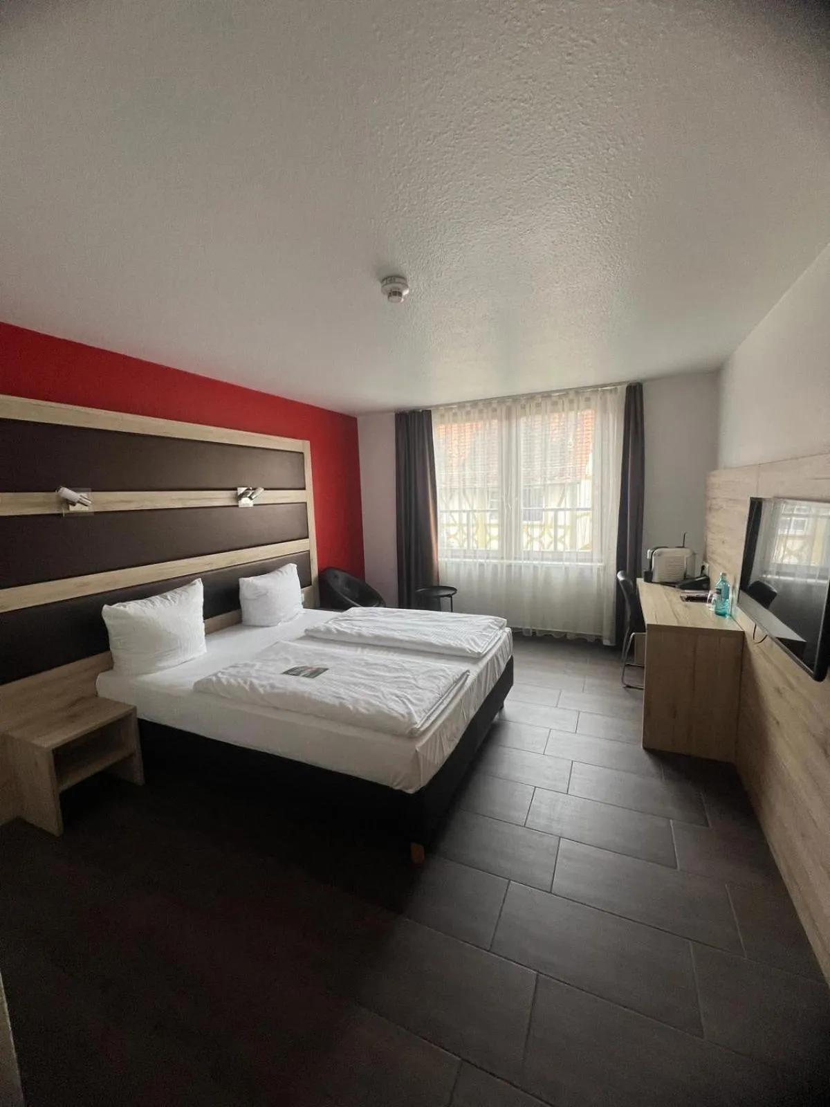 Photo of the whole room, Bed in ACHAT Hotel Heppenheim