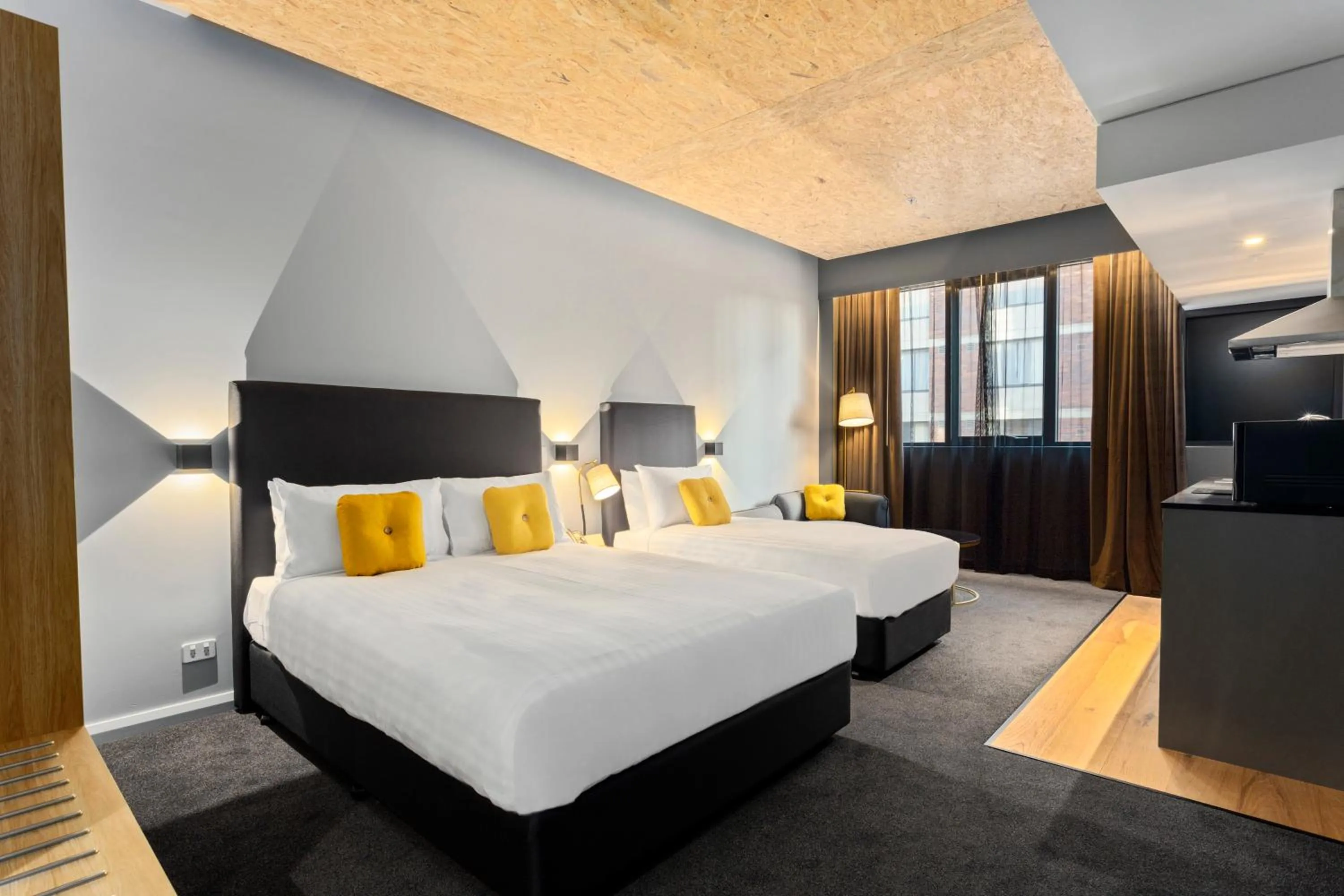 Bed in Hobart City Apartments