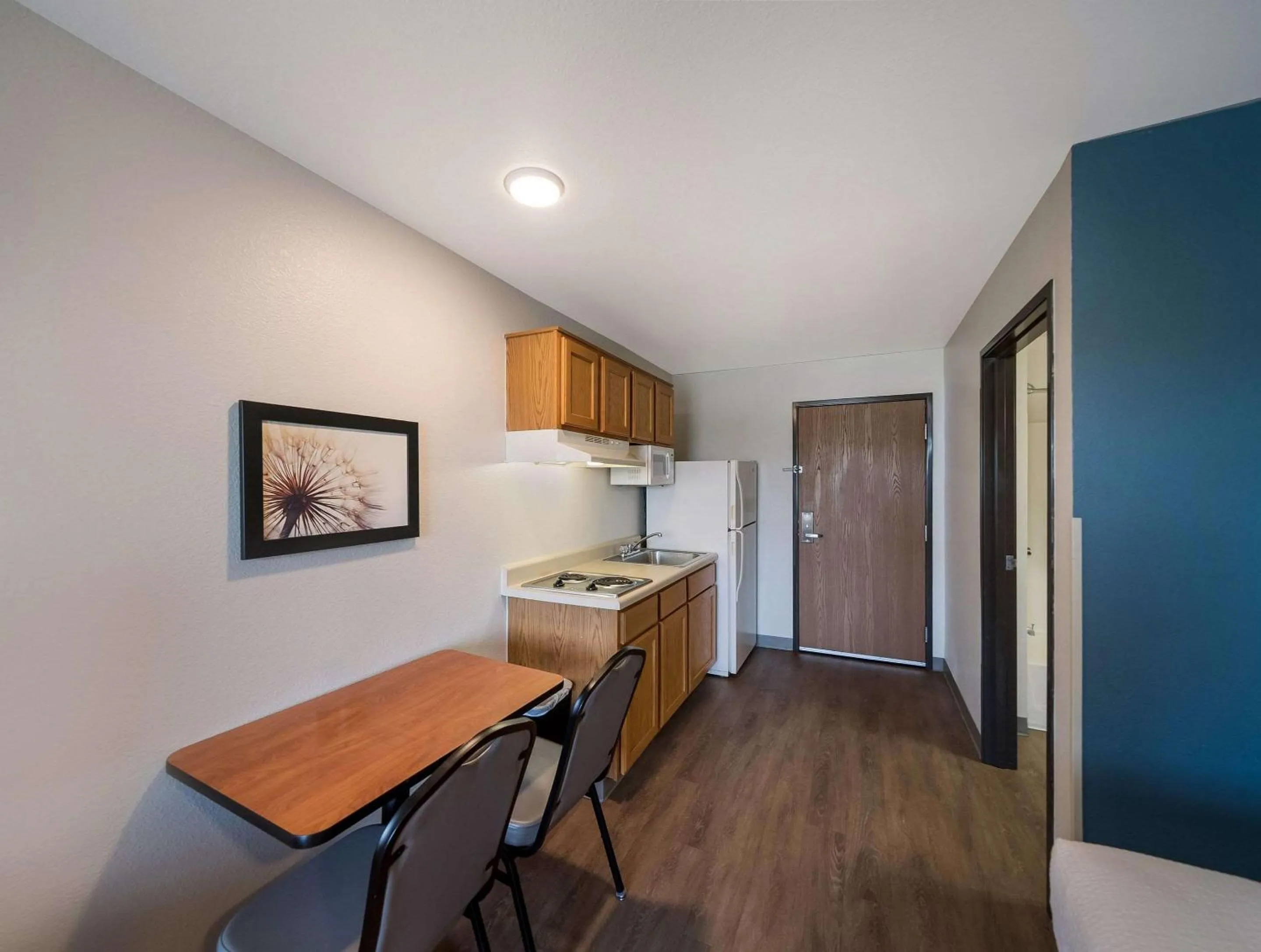 Bedroom in WoodSpring Suites Fort Worth Trophy Club