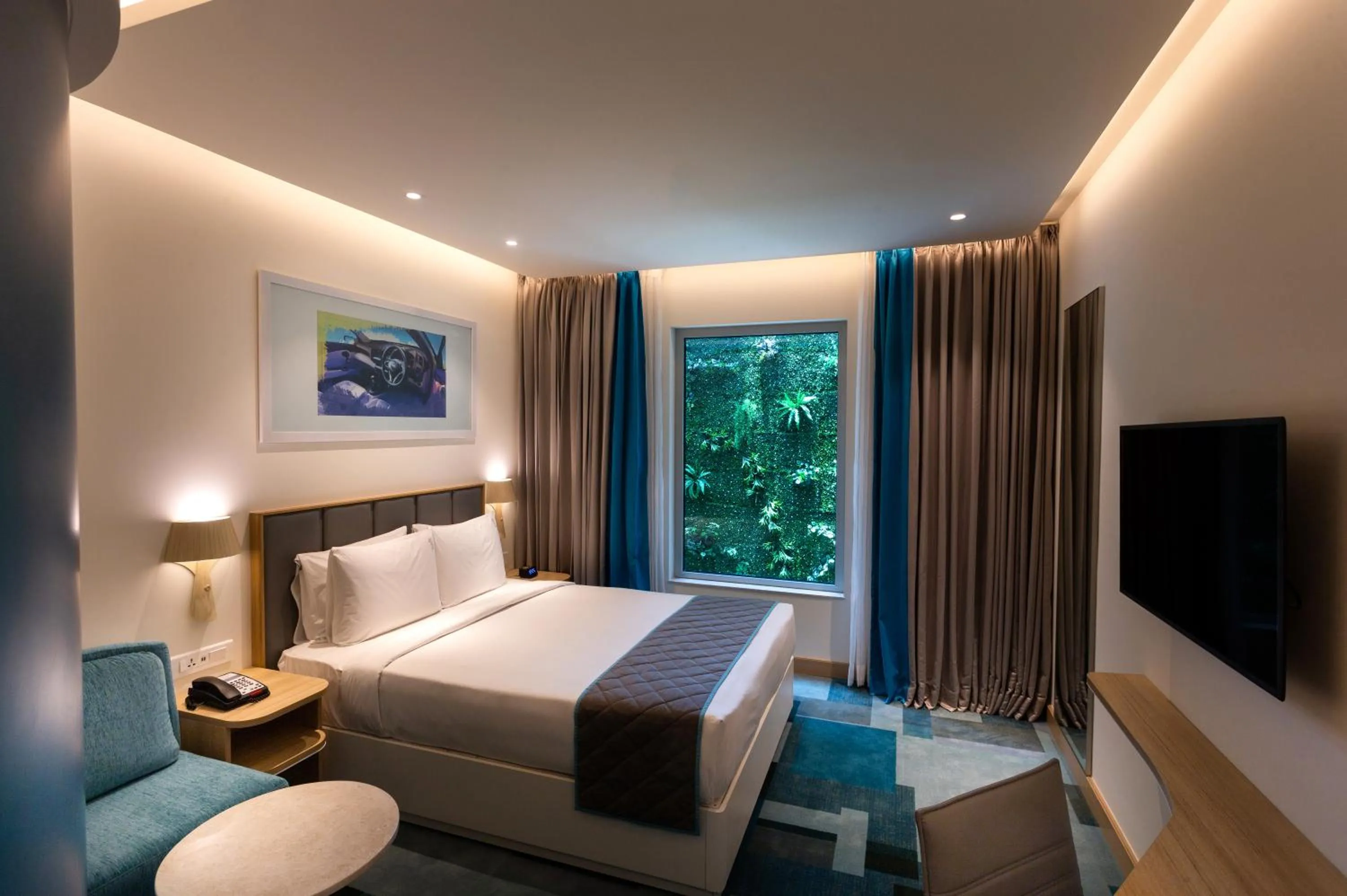 Seating area, Bed in Holiday Inn Express & Suites Bengaluru Old Madras Road by IHG