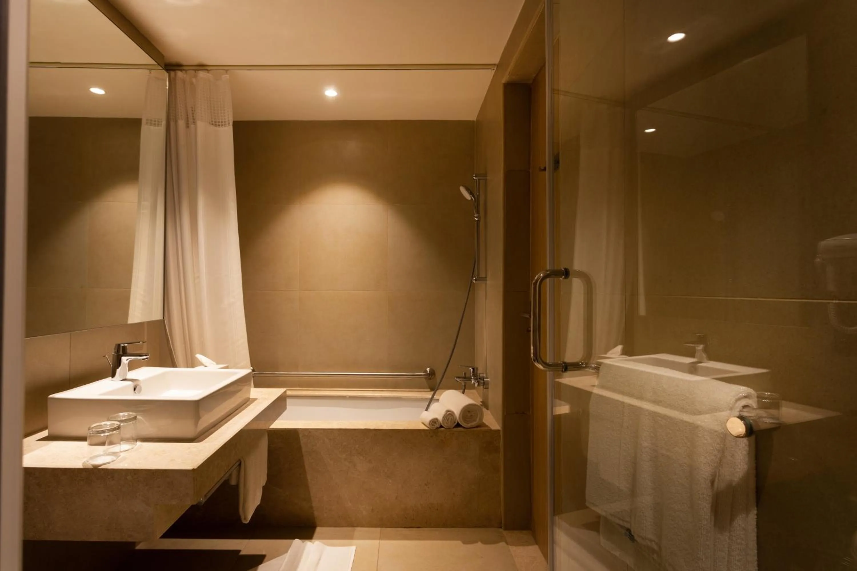 Bathroom in Holiday Inn Express & Suites Bengaluru Old Madras Road by IHG