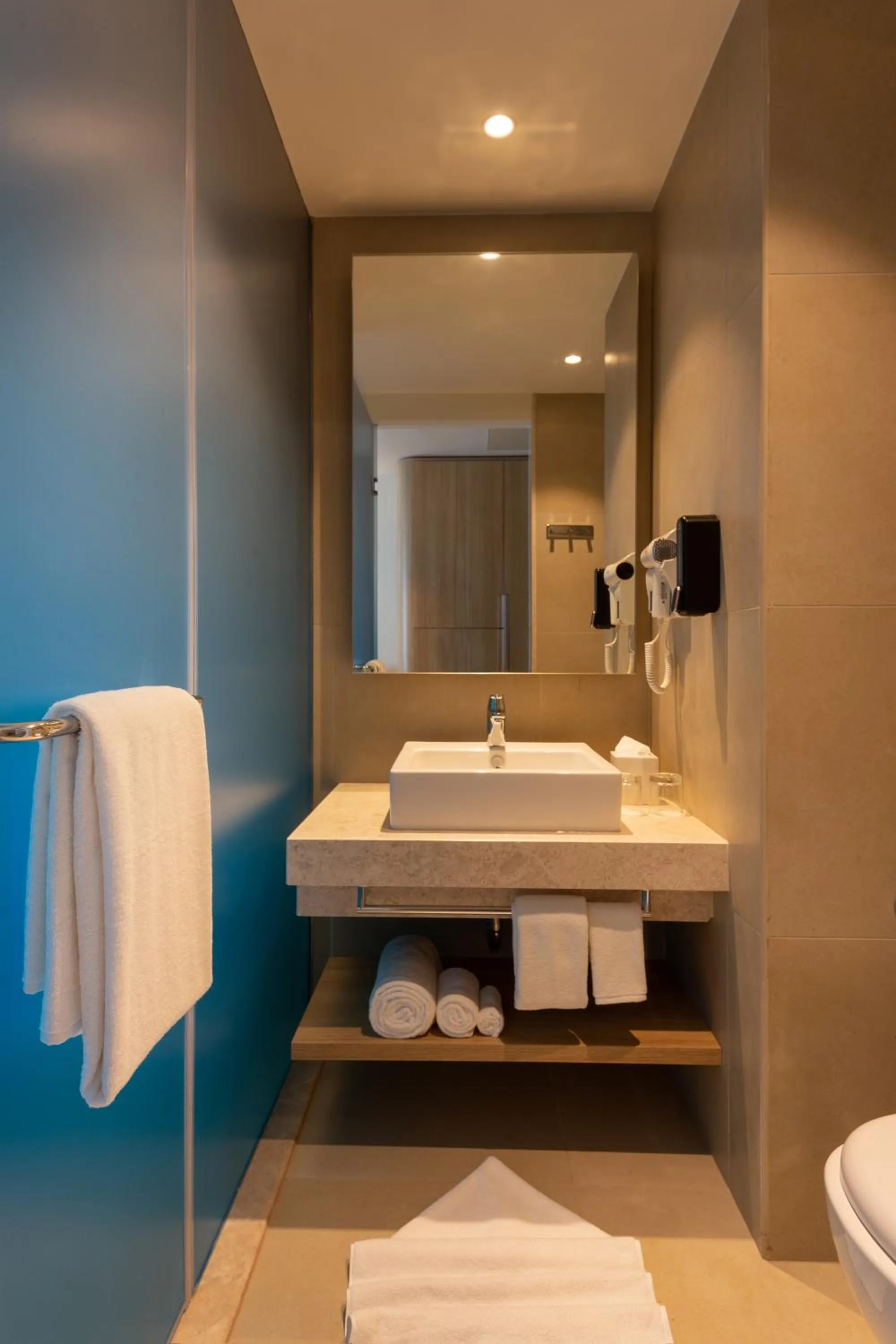 Bathroom in Holiday Inn Express & Suites Bengaluru Old Madras Road by IHG