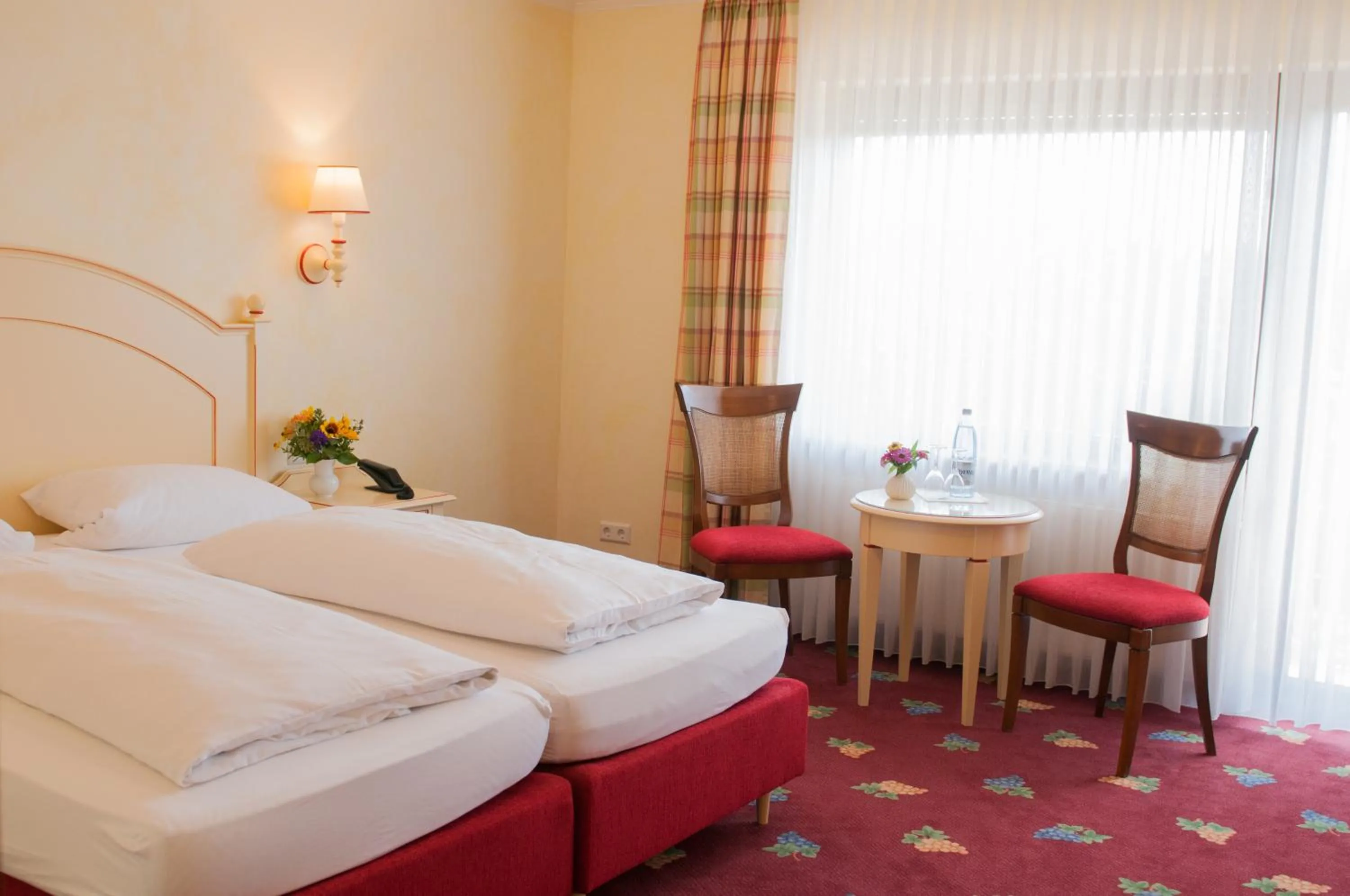 Photo of the whole room, Bed in Gasthaus Weingut Stahl