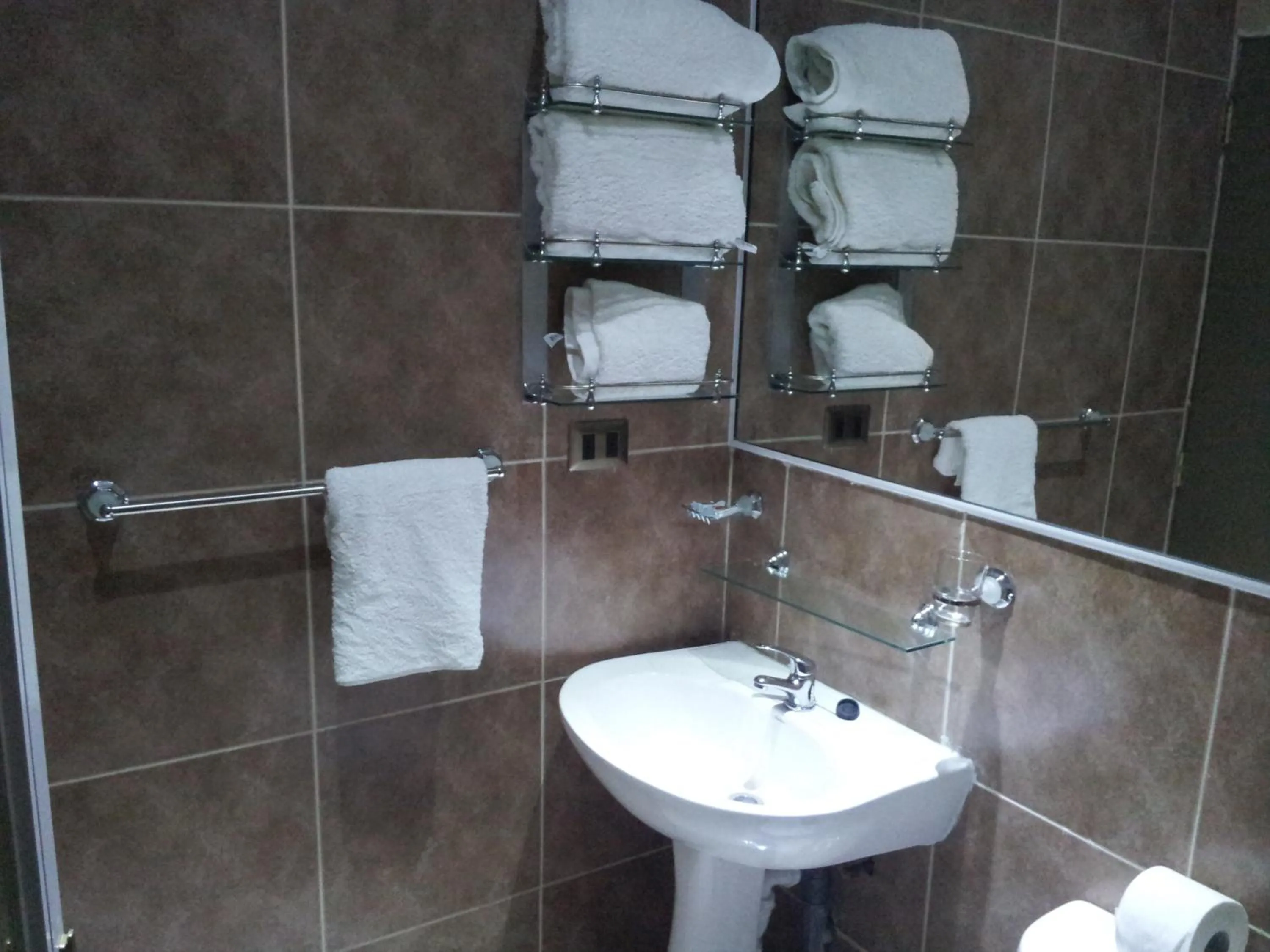 Bathroom in Hotel Astore Suites
