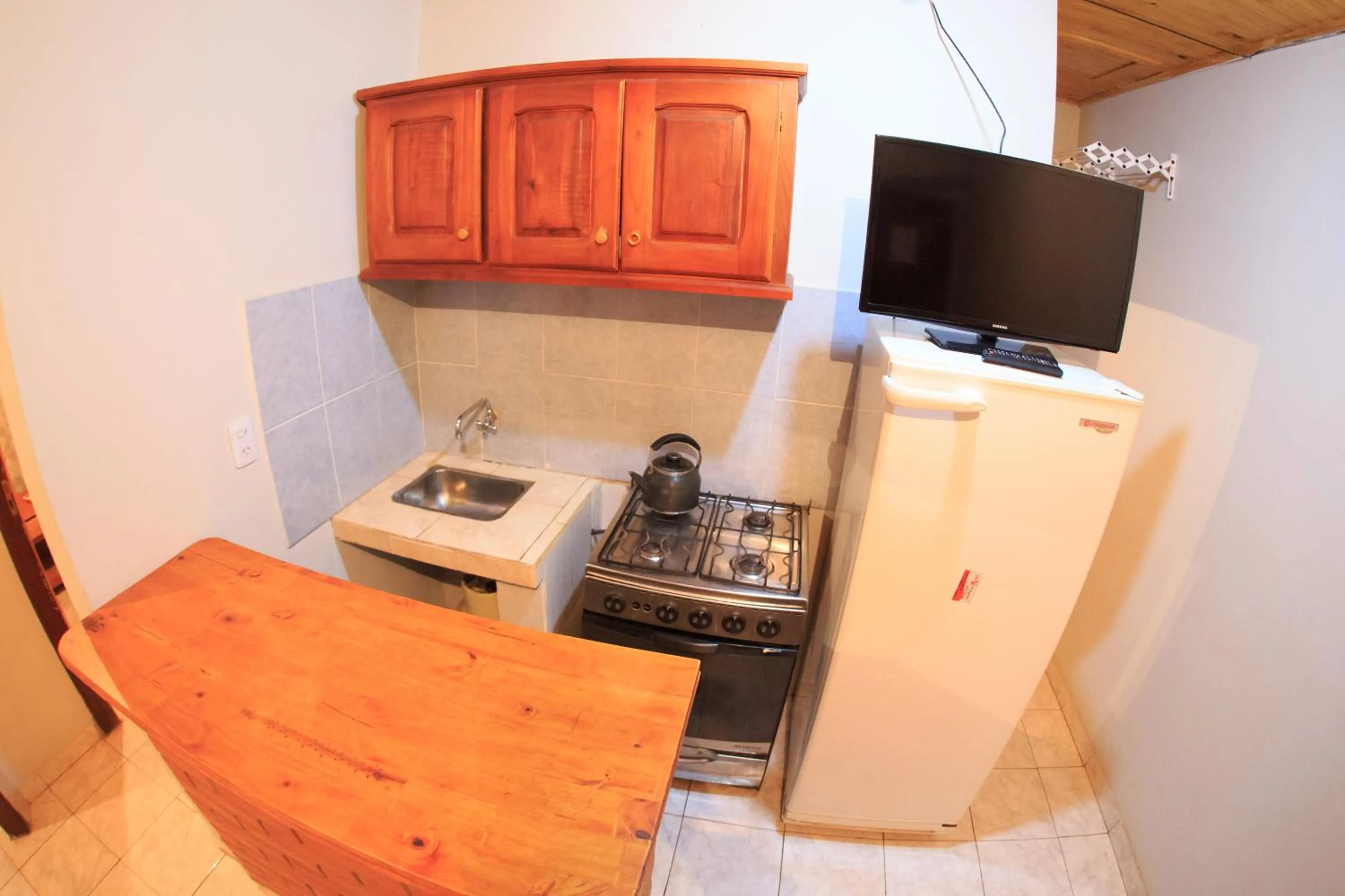 Kitchen or kitchenette in Lo de Carmen Apart